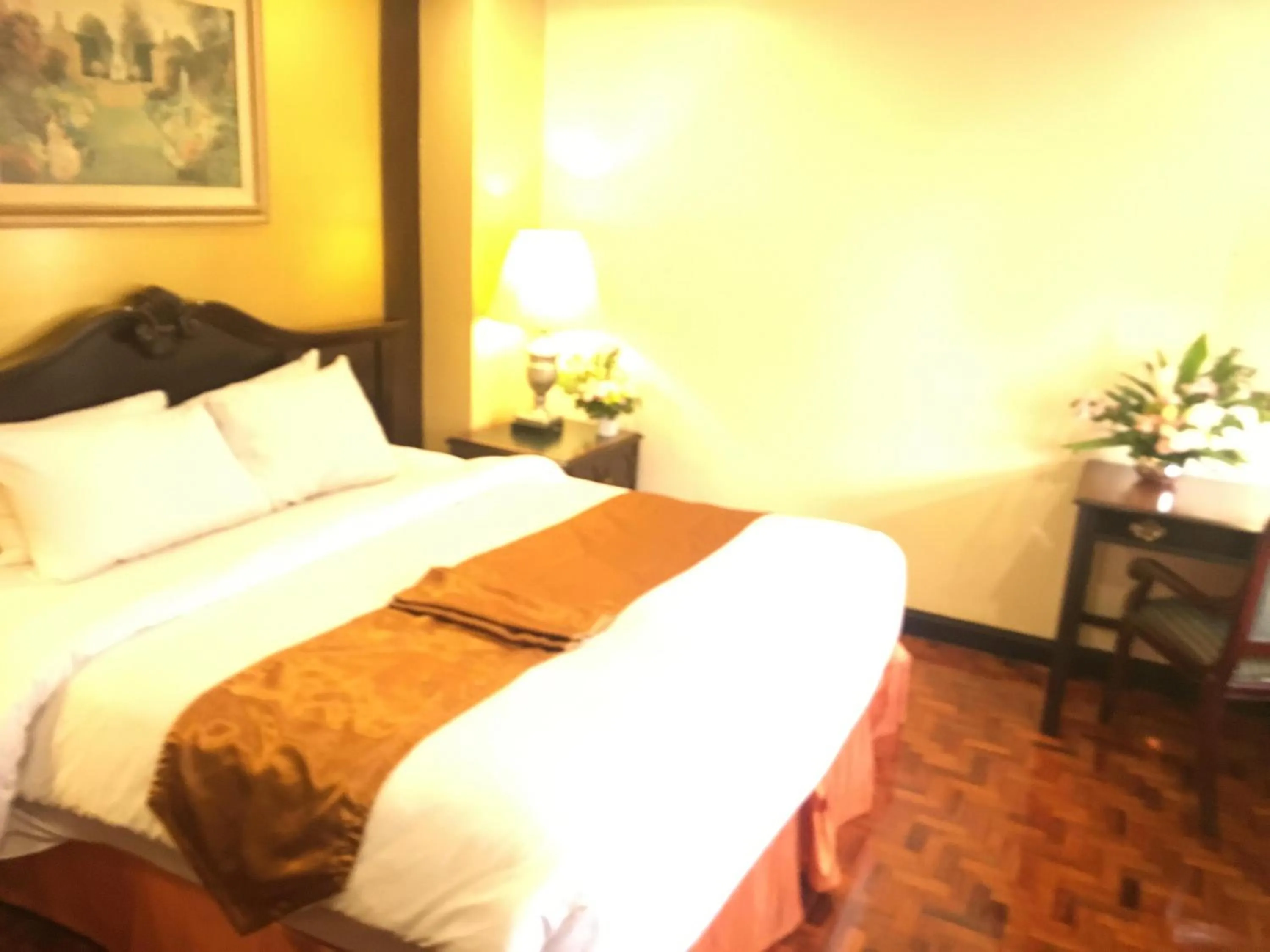 Bed in Lourdes Family Suites Makati powered by Cocotel