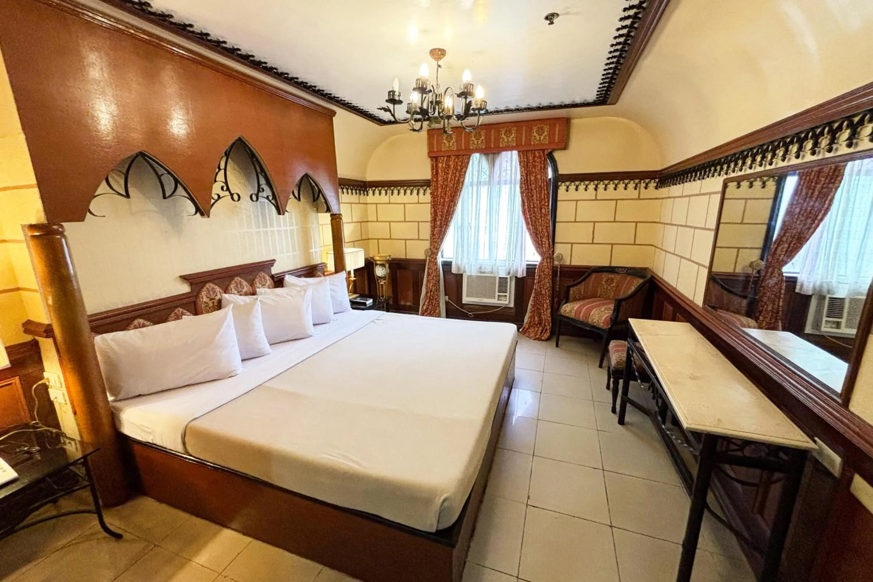 Bed in Camelot Hotel Quezon City powered by Cocotel