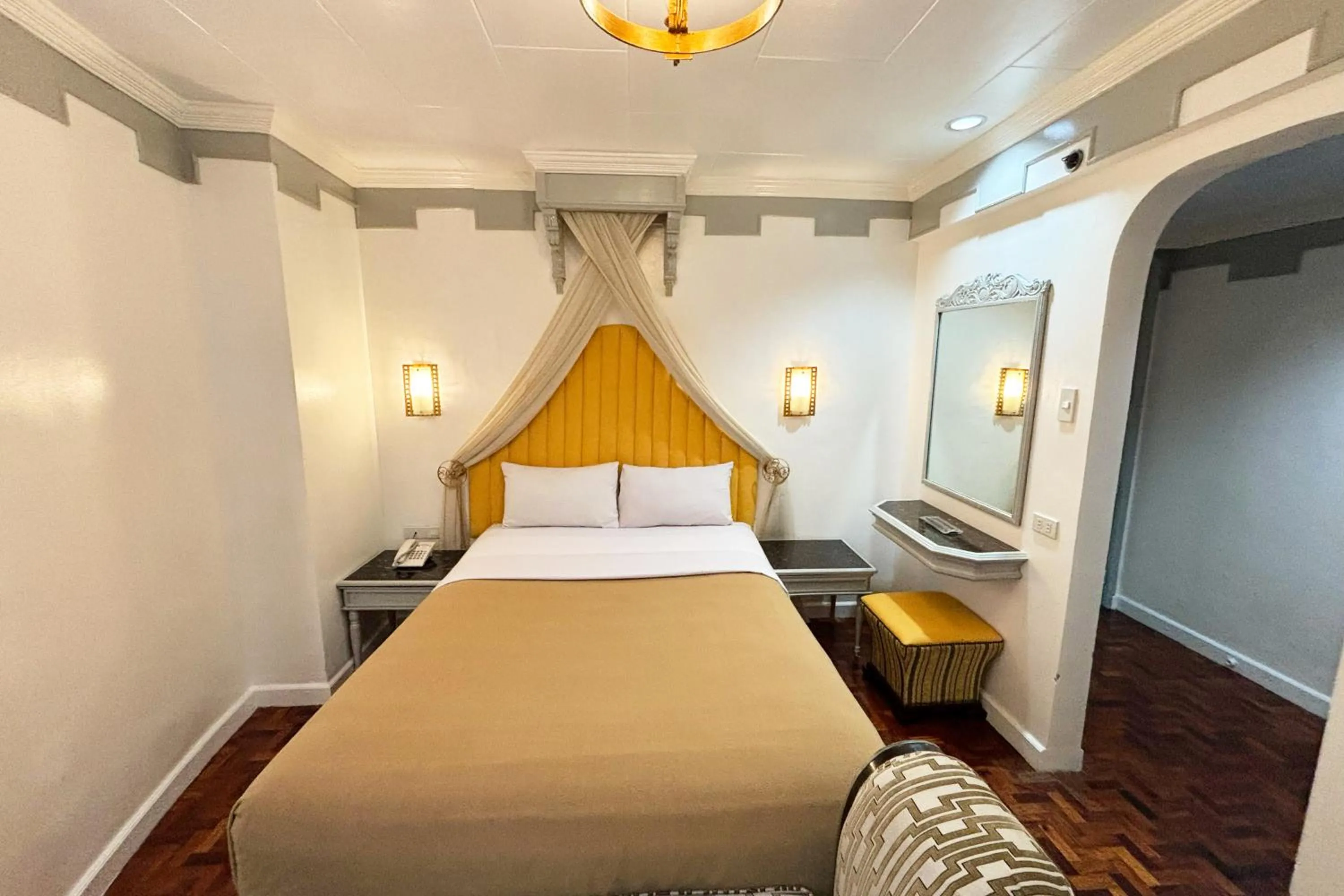 Bed in Camelot Hotel Quezon City powered by Cocotel