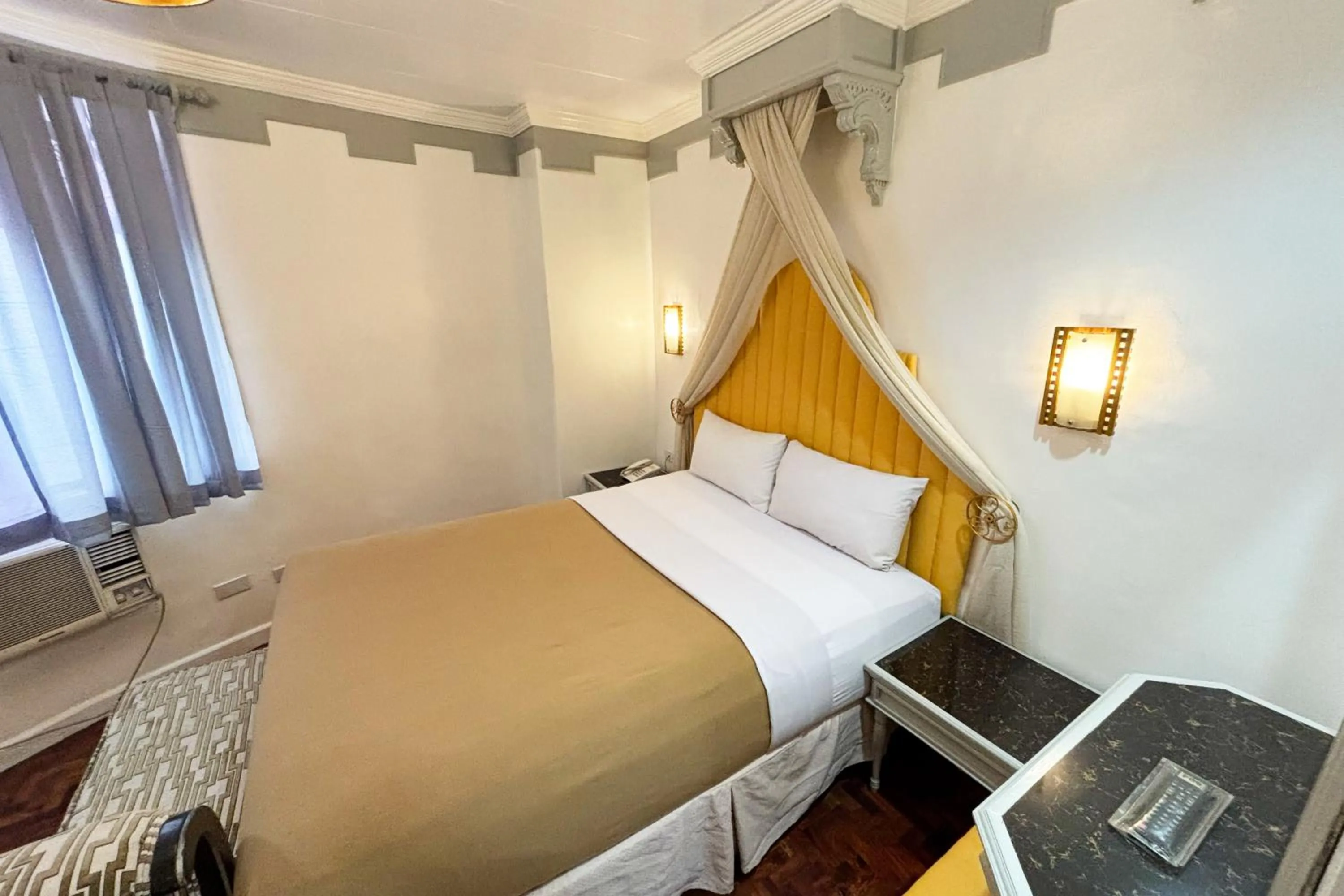 Bed in Camelot Hotel Quezon City powered by Cocotel