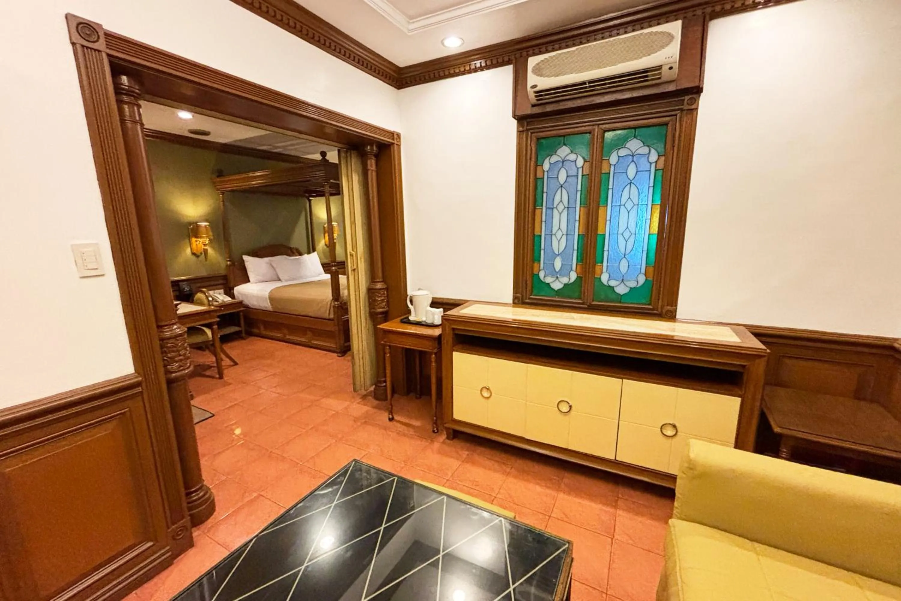 Bed in Camelot Hotel Quezon City powered by Cocotel