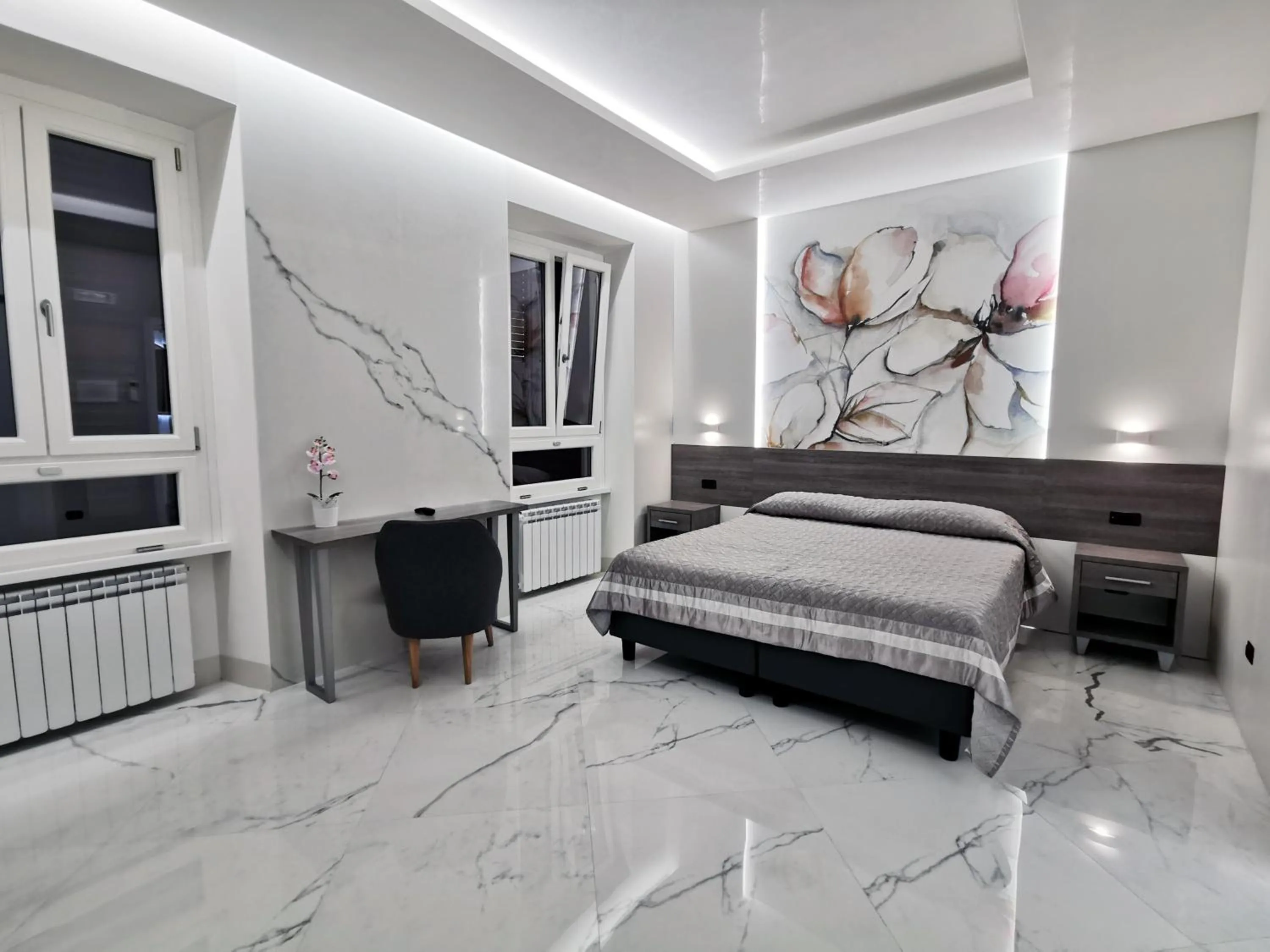 Bed in Hotel Valentino Palace