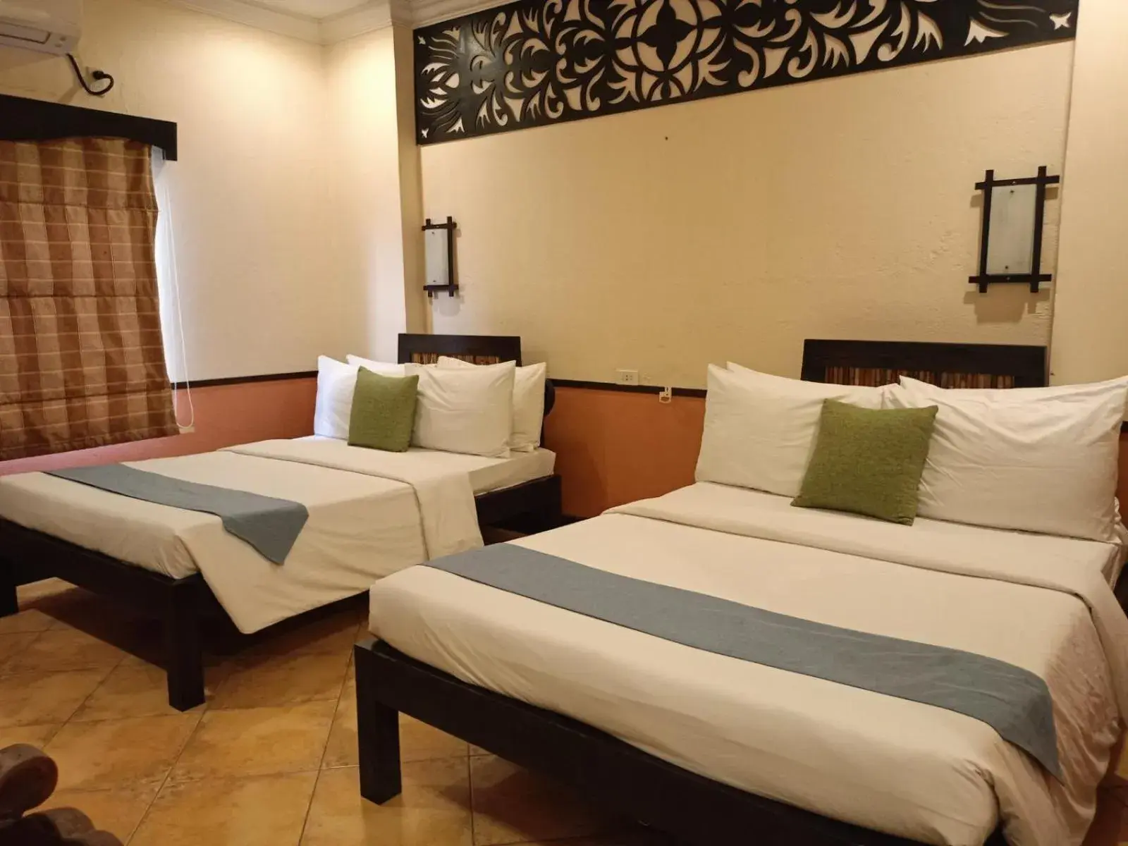 Bed in Playa Tropical Resort Hotel Bed in Playa Tropical Resort Hotel