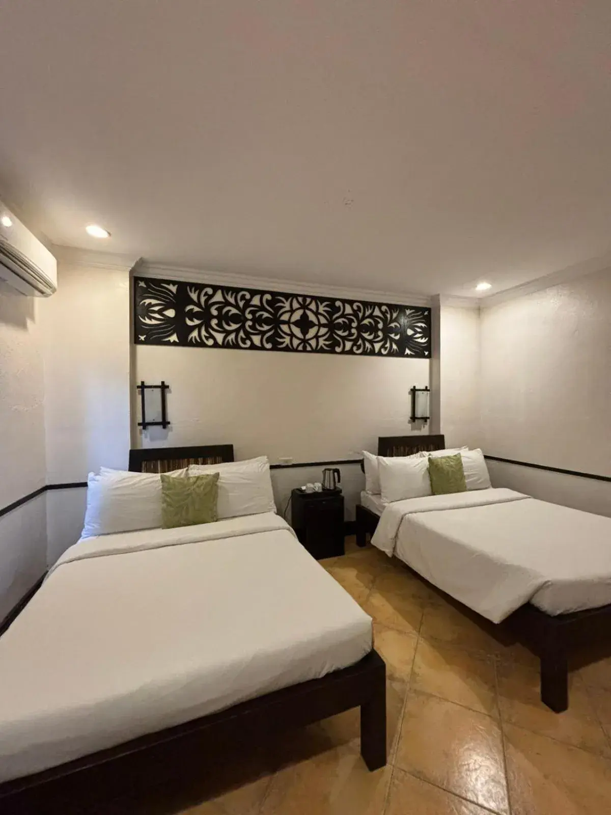 Bed in Playa Tropical Resort Hotel Bed in Playa Tropical Resort Hotel