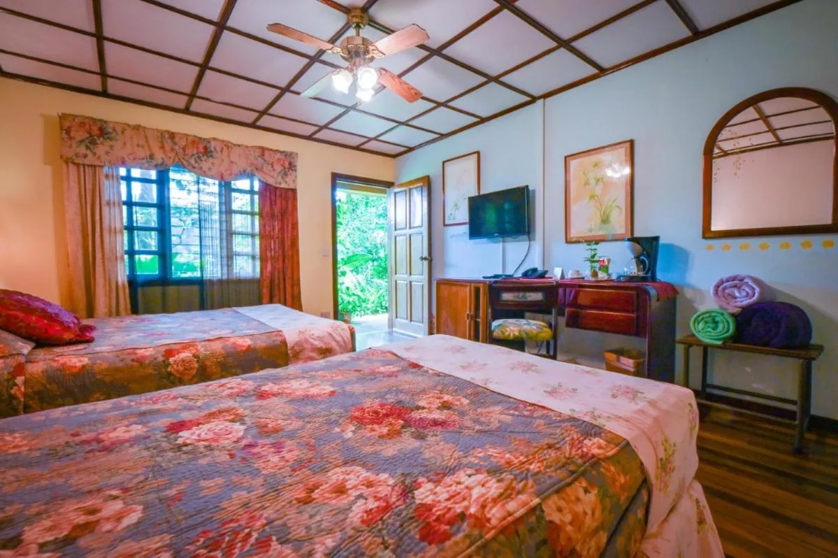 Bedroom, Bed in Lands in Love Hotel and Resort