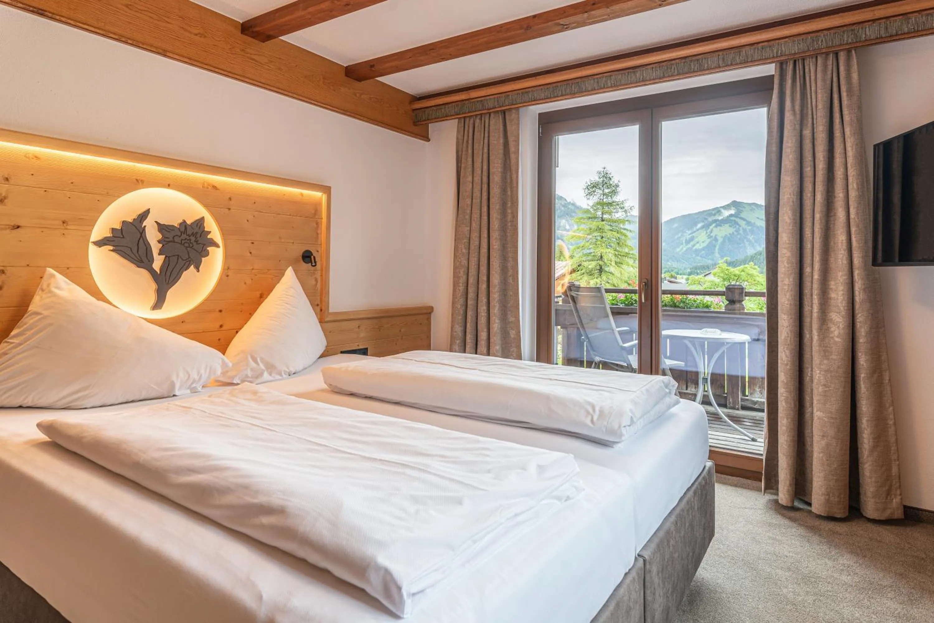 Bed in Hotel Tyrol am Haldensee