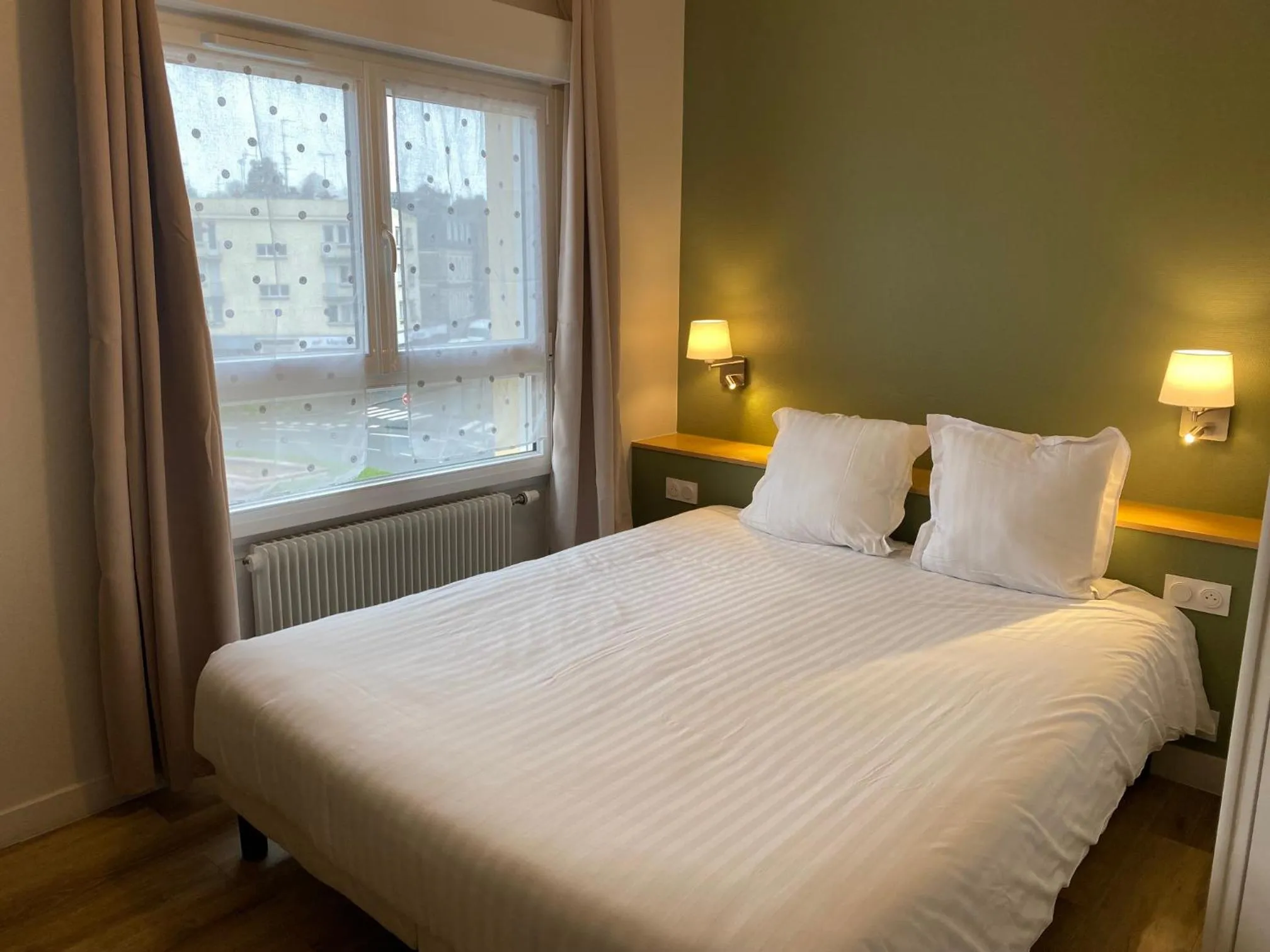 Bed in Hotel de Bretagne