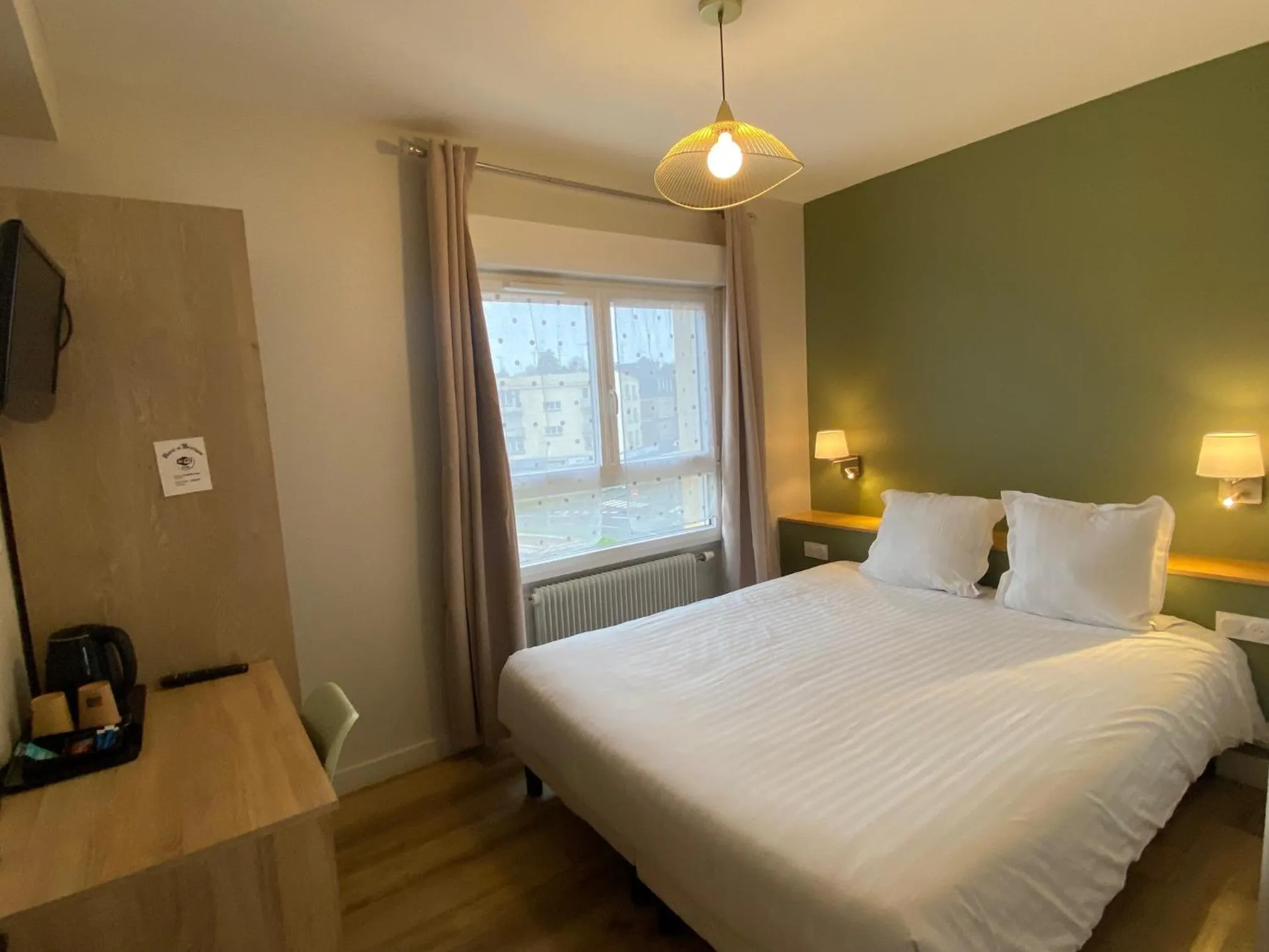 Bed in Hotel de Bretagne