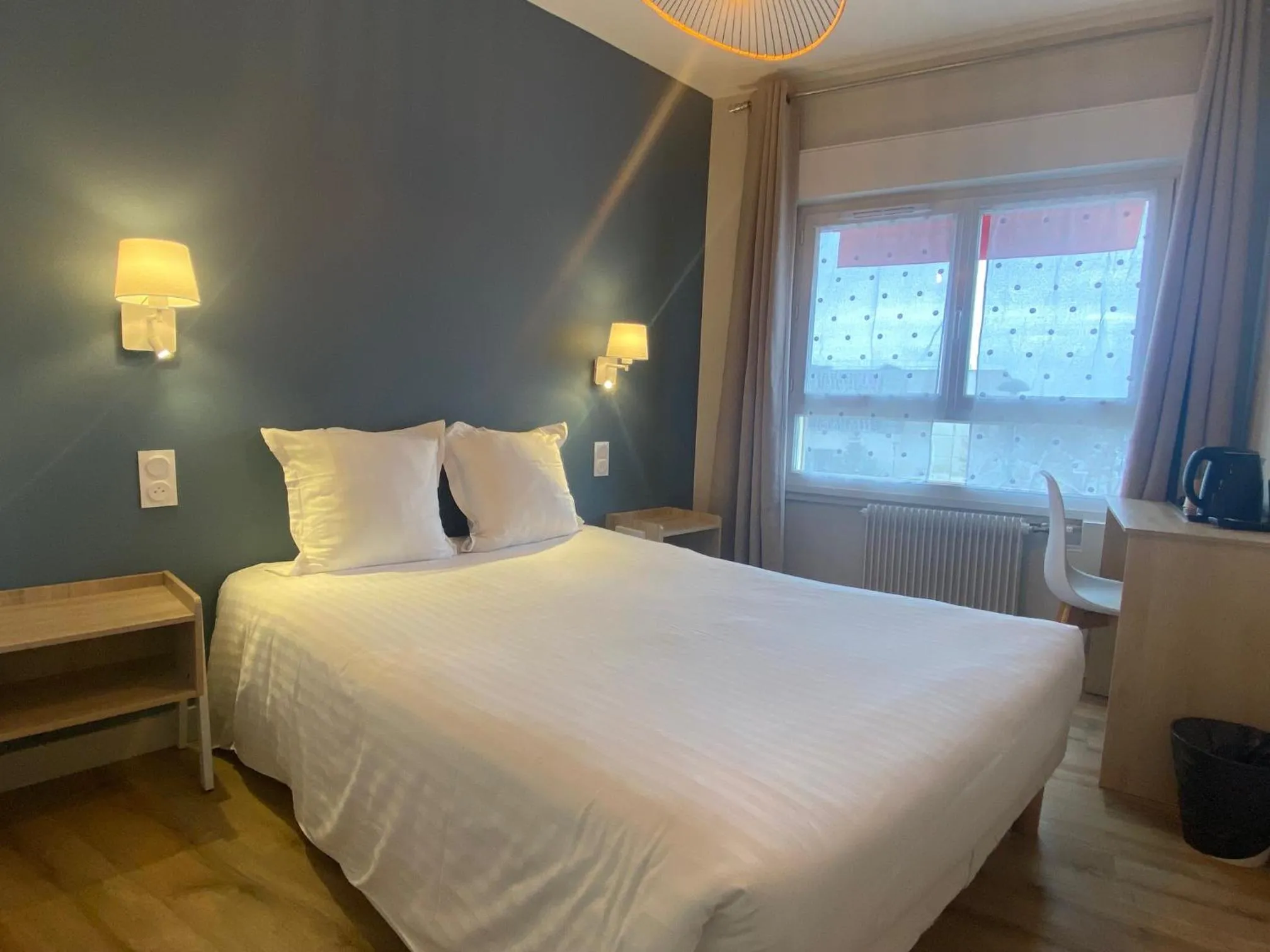 Bed in Hotel de Bretagne