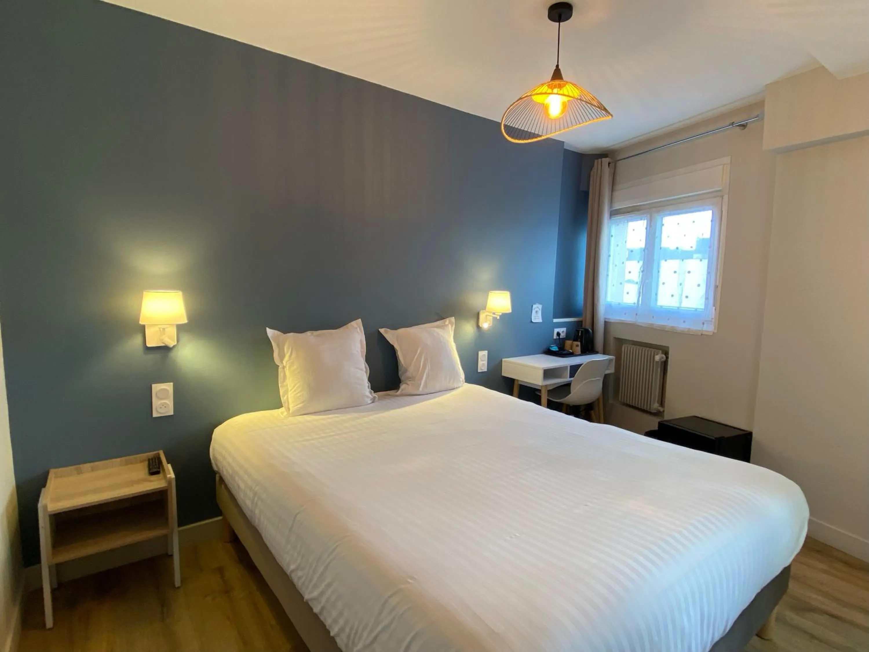 Bed in Hotel de Bretagne