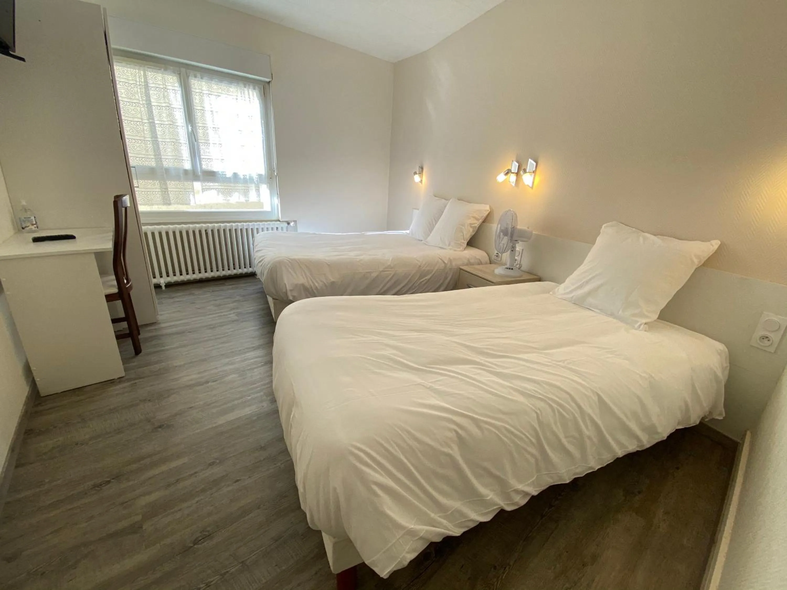 Bed in Hotel de Bretagne