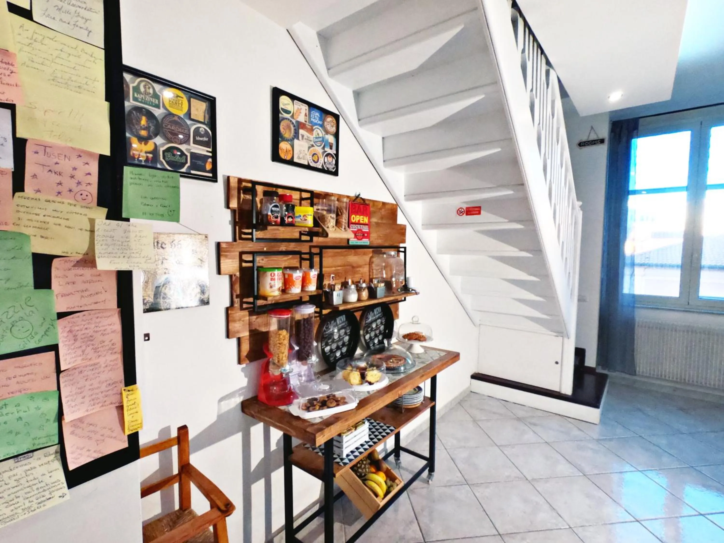 Communal lounge/ TV room in Il BorGhetto Guest House