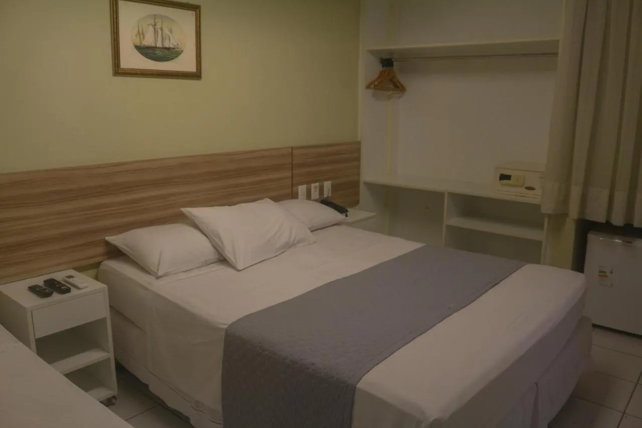 Bed in Hotel Três Caravelas