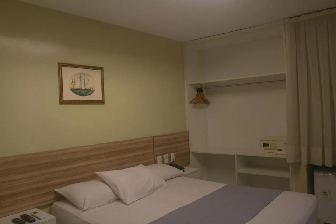 Bed in Hotel Três Caravelas