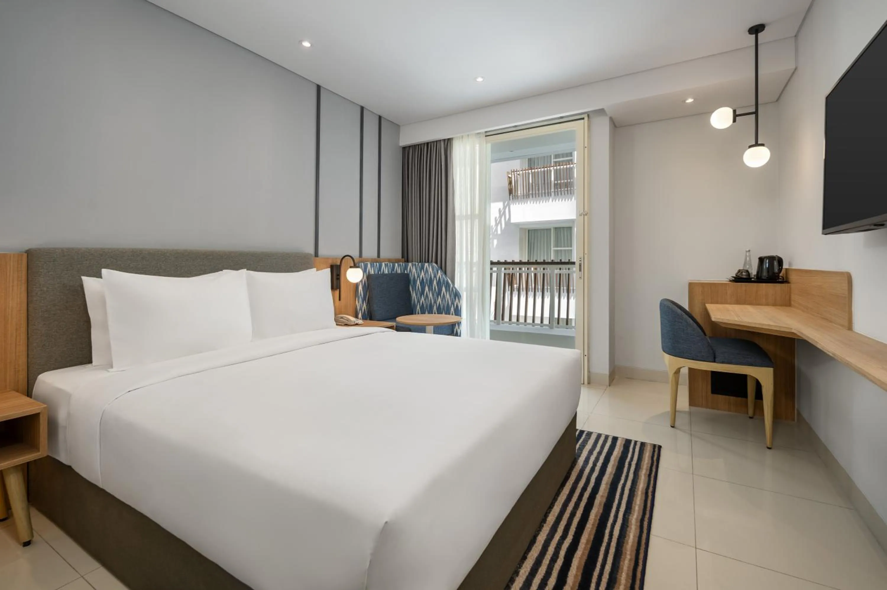 Bed in Holiday Inn Express Bali Sunset Road by IHG