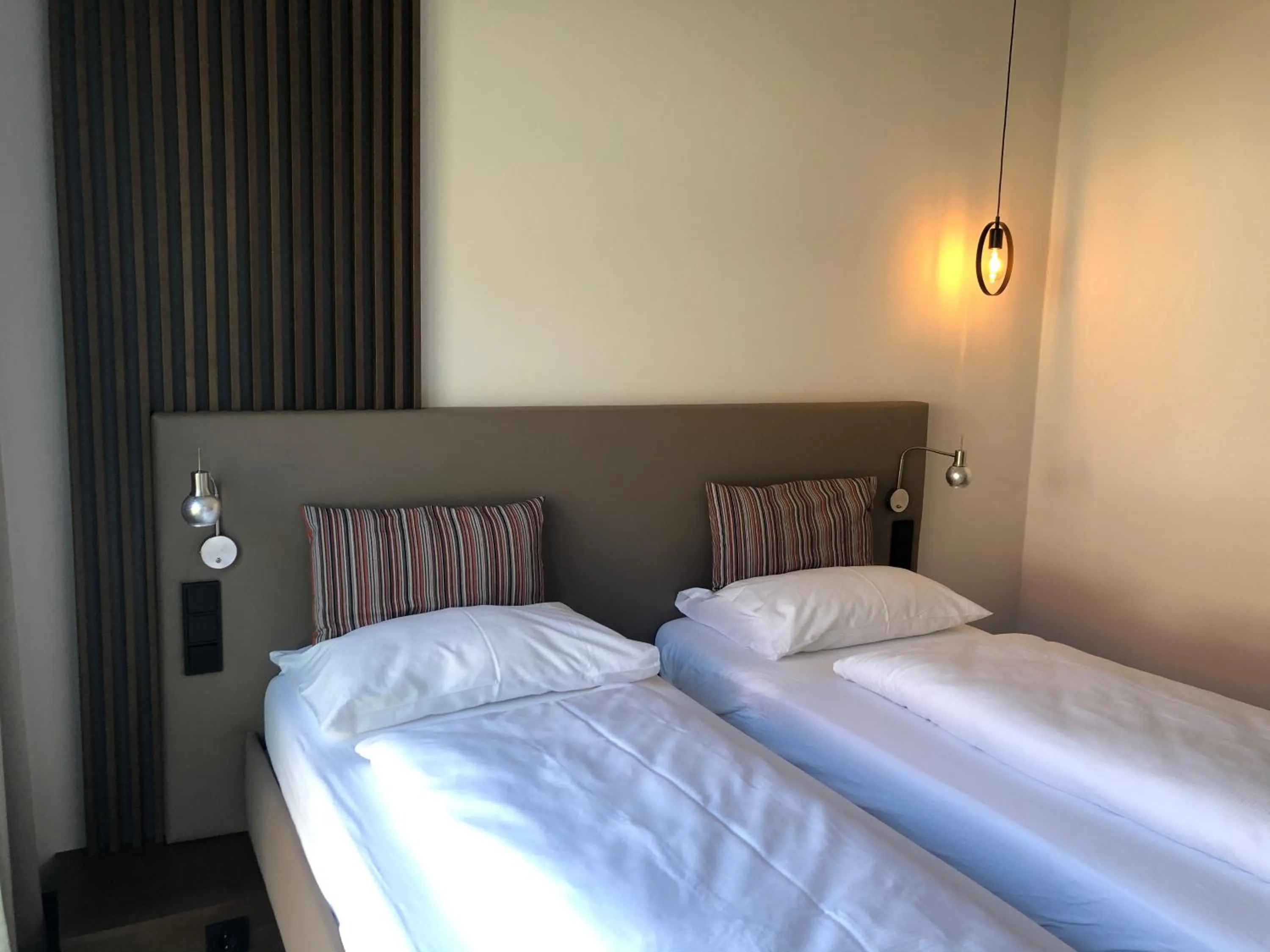 Photo of the whole room, Bed in Hotel Donauhof Mauthausen