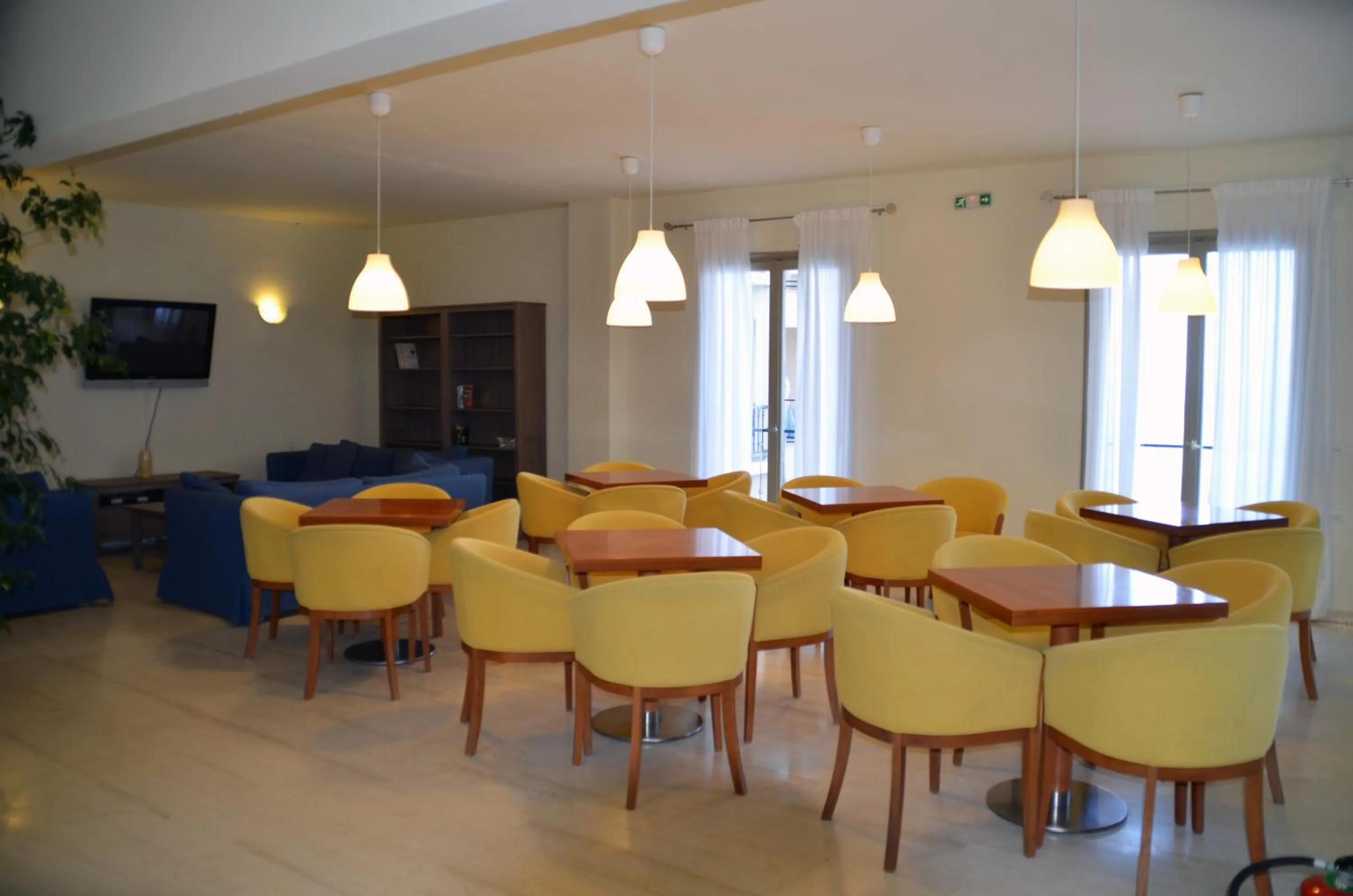 Communal lounge/ TV room in Mitsis Belvedere