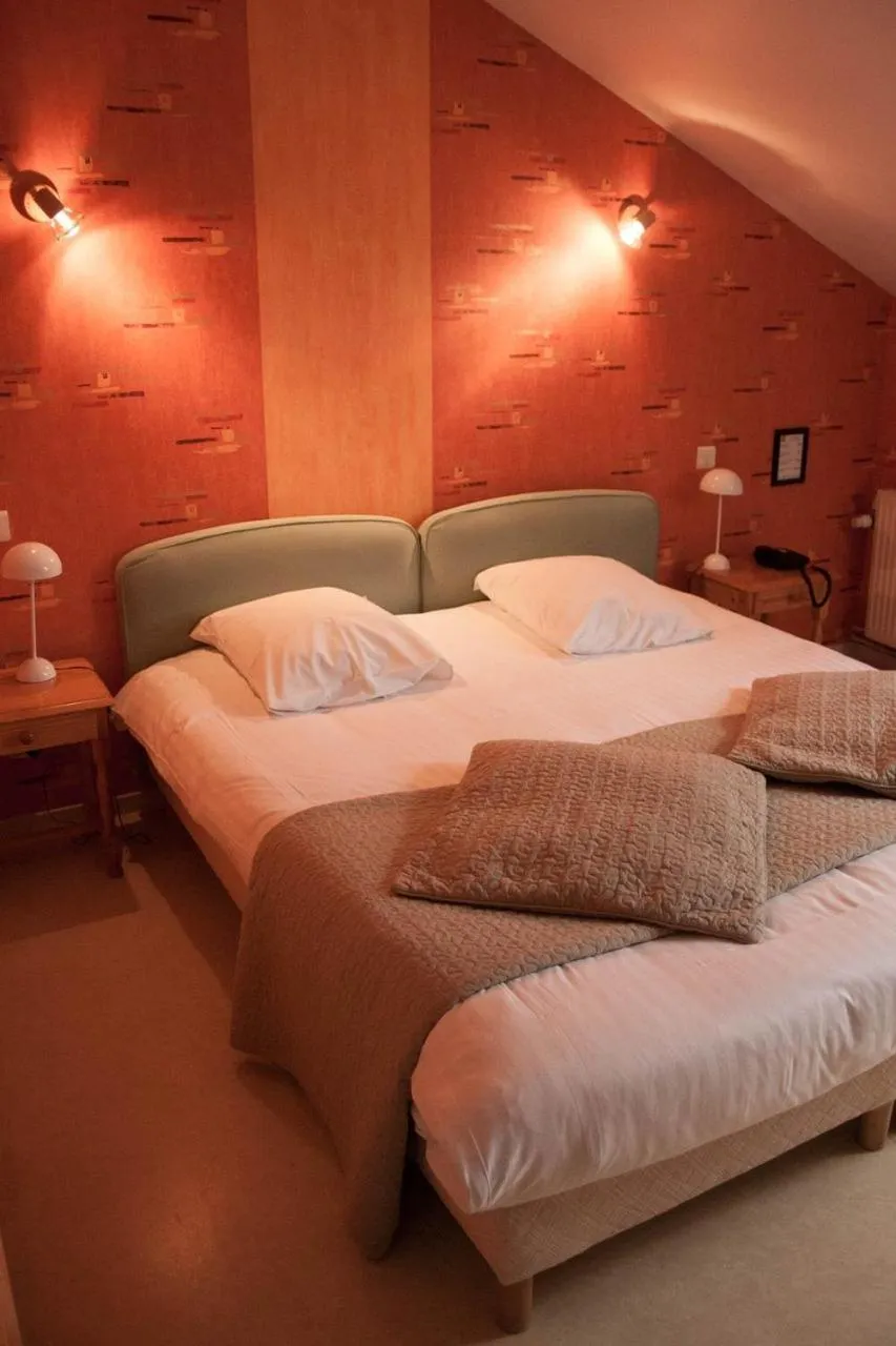 Bed in Auberge de la Fontaine