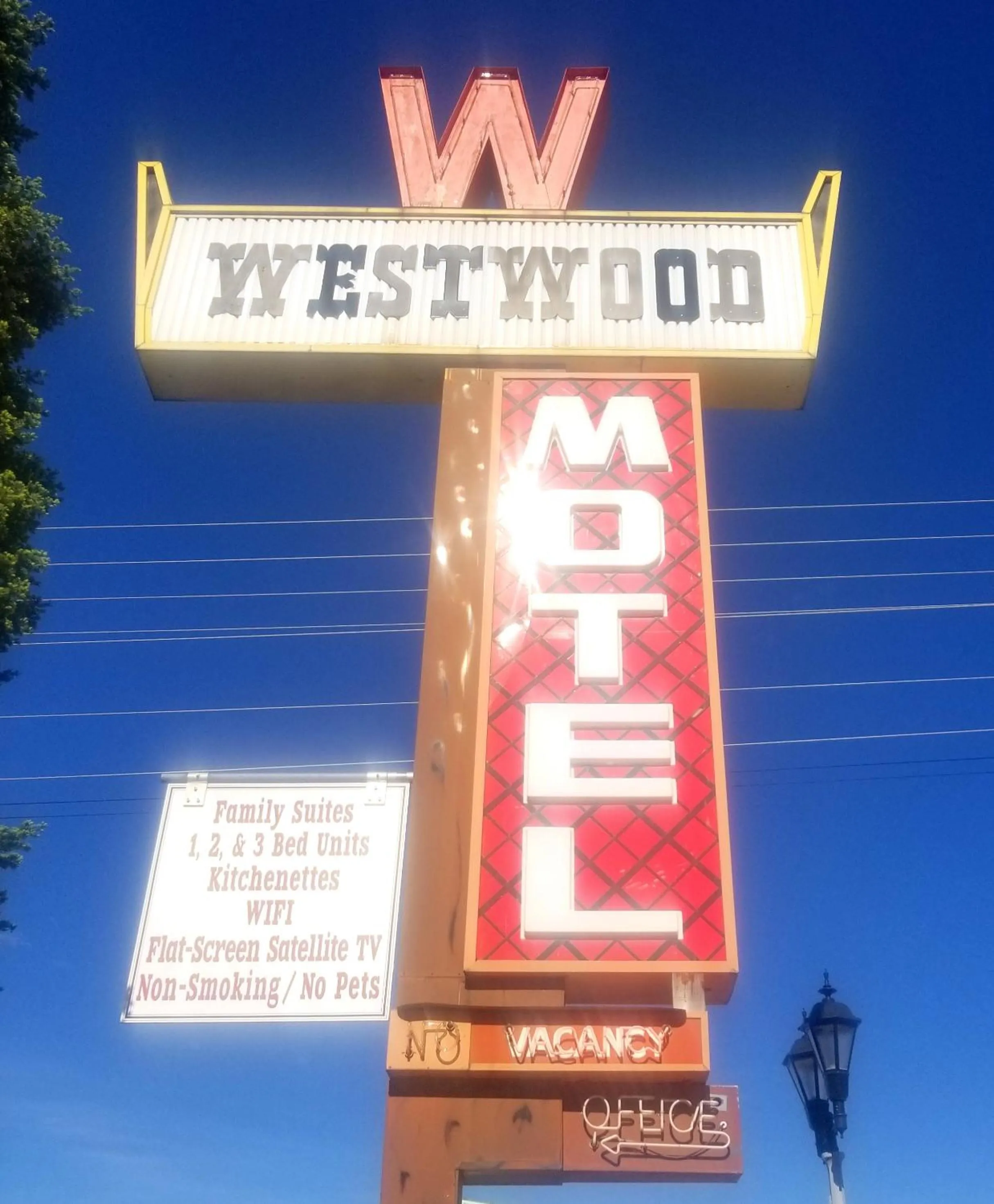 Property logo or sign in Westwood Motel