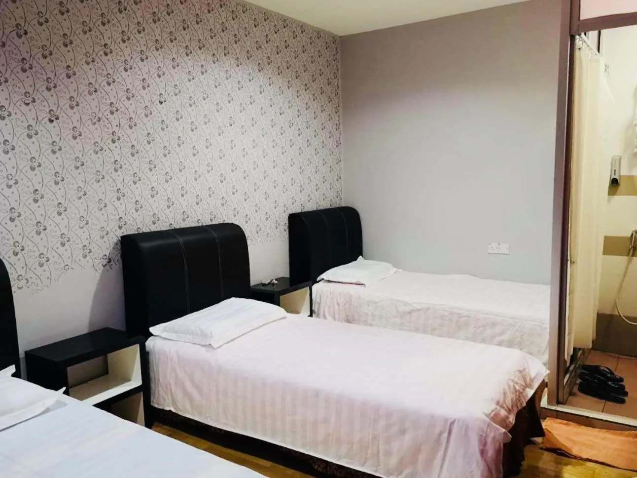 Bed in Home Inn Hotel