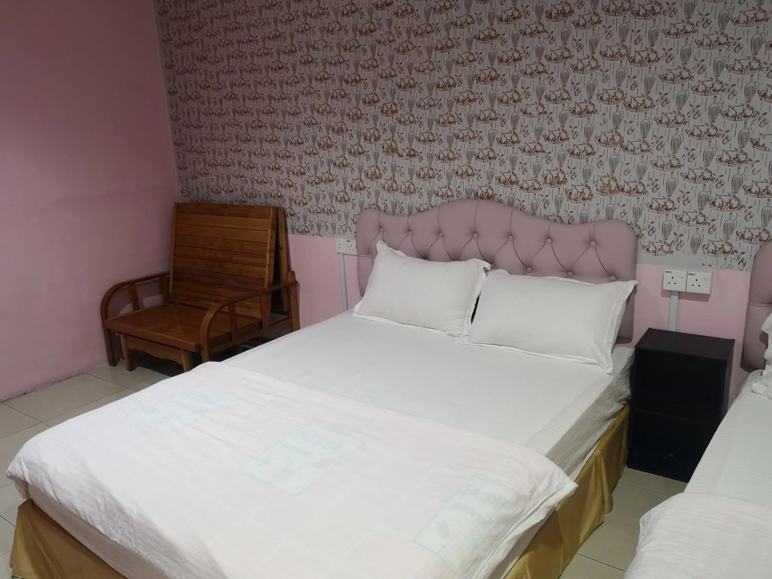 Bed in Home Inn Hotel