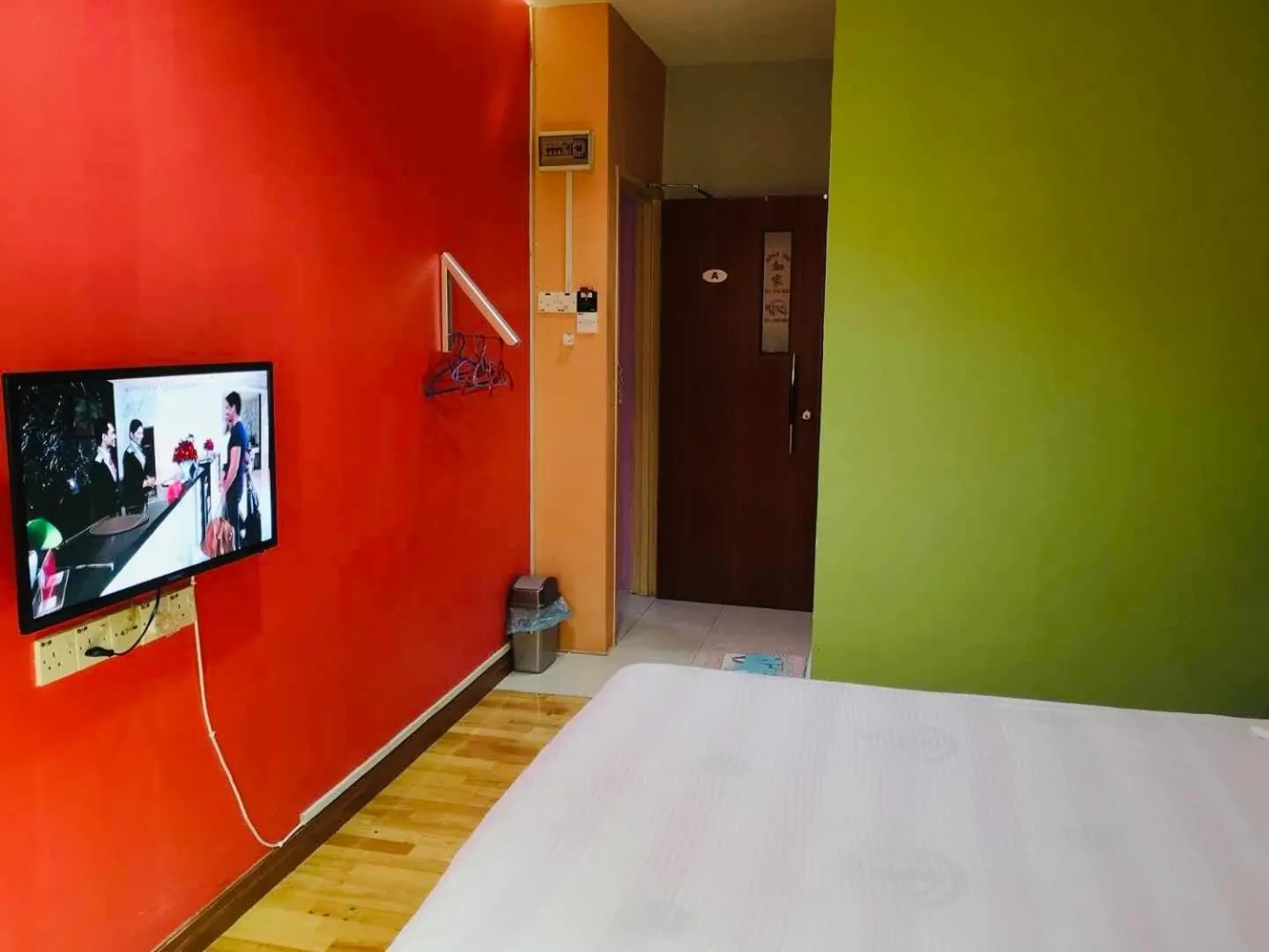 Bed in Home Inn Hotel