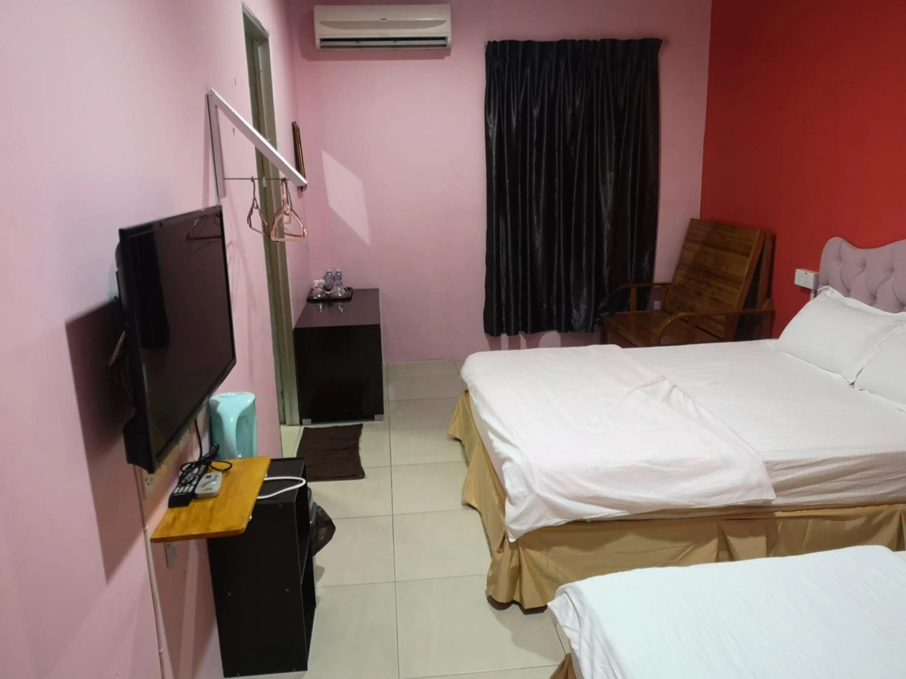 Bed in Home Inn Hotel