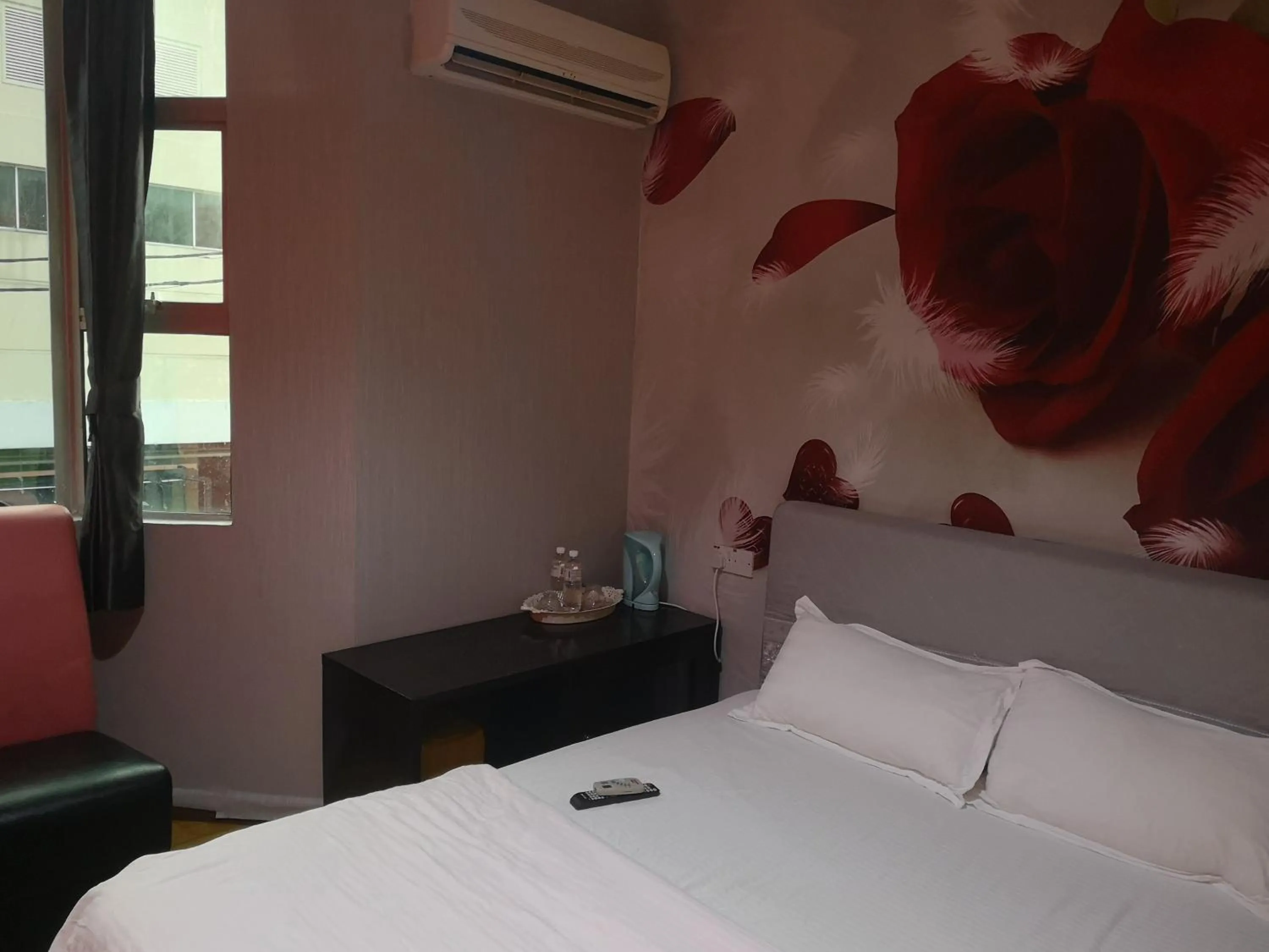 Bed in Home Inn Hotel