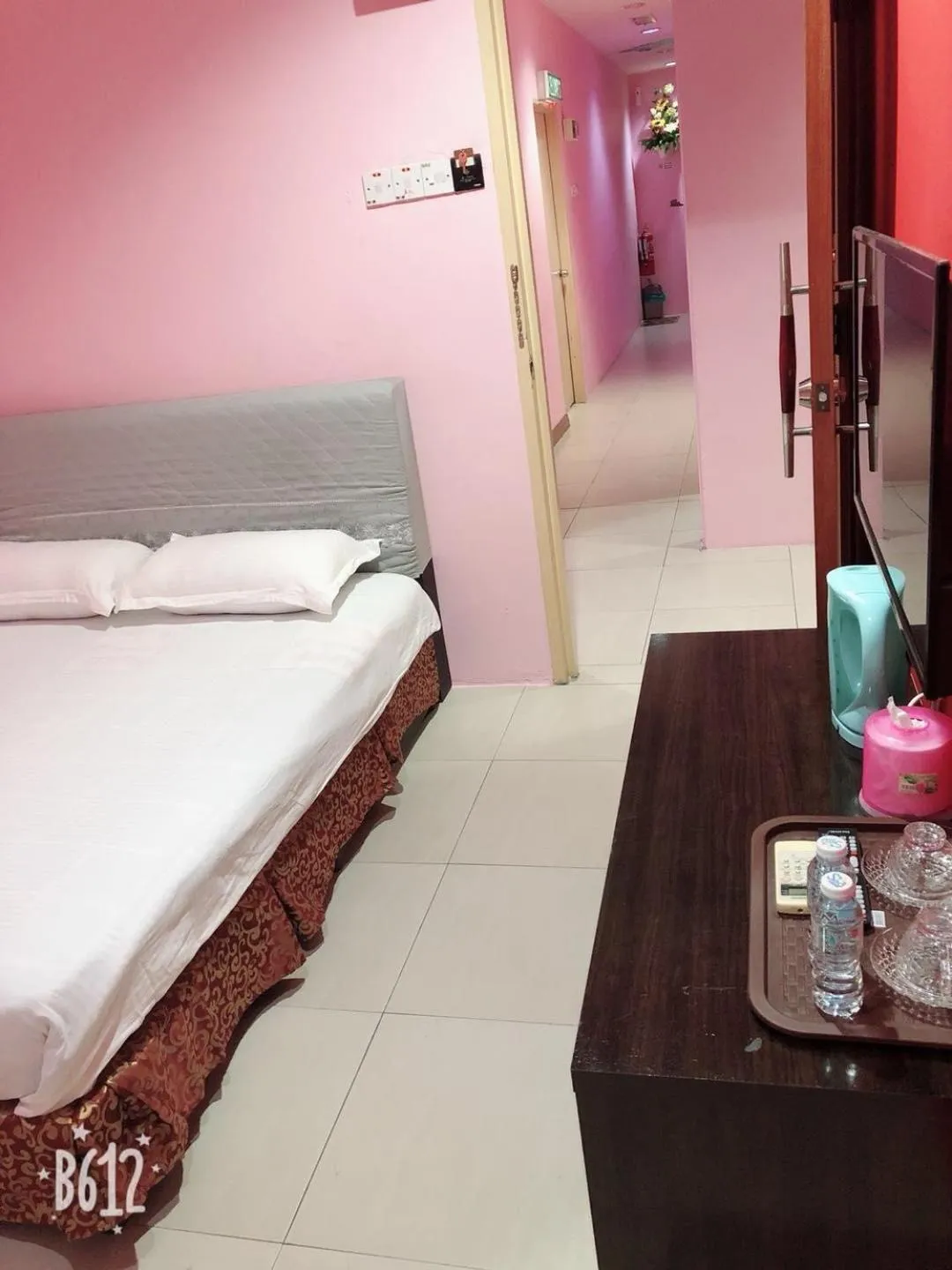 Bed in Home Inn Hotel