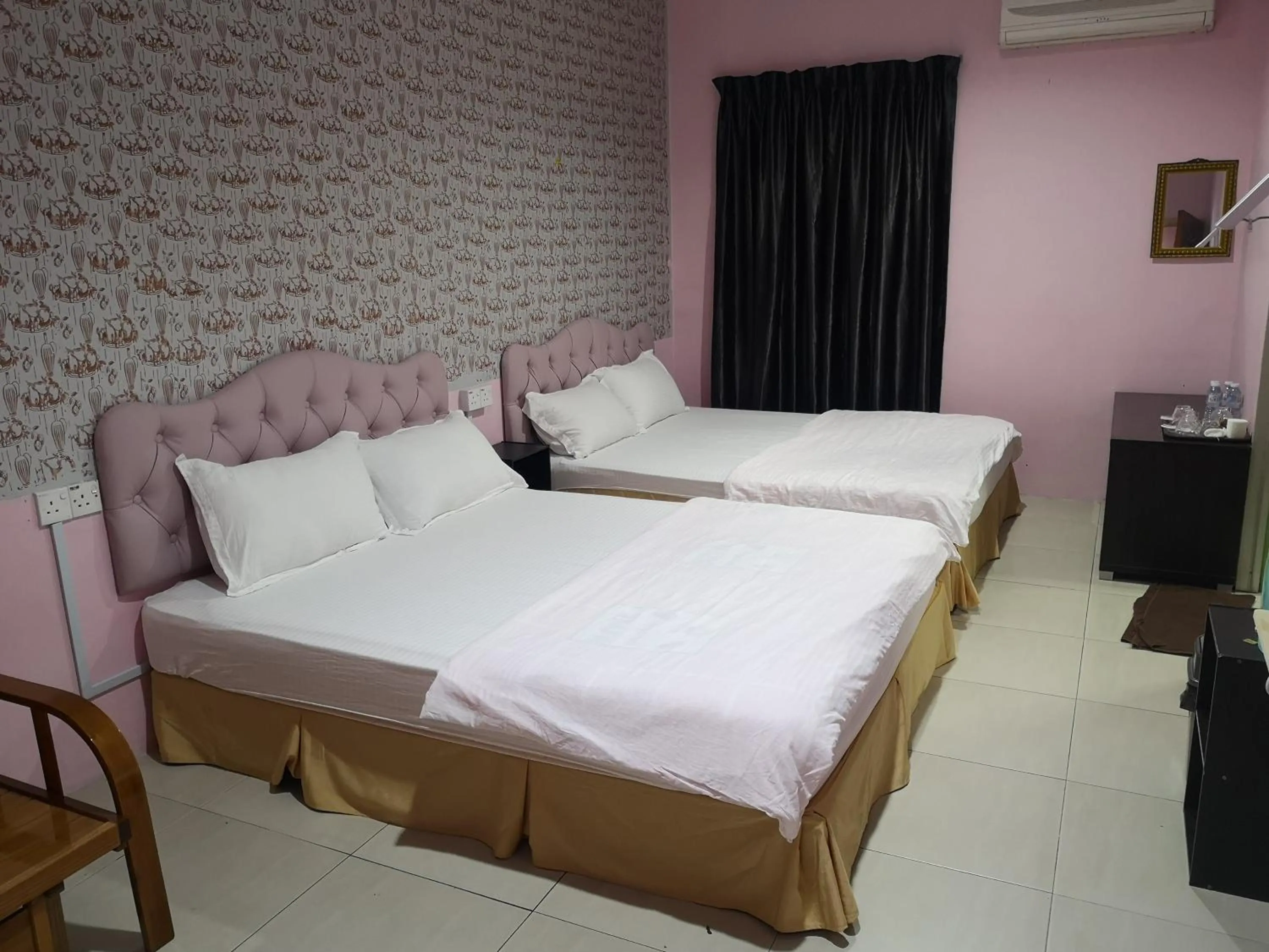 Bed in Home Inn Hotel