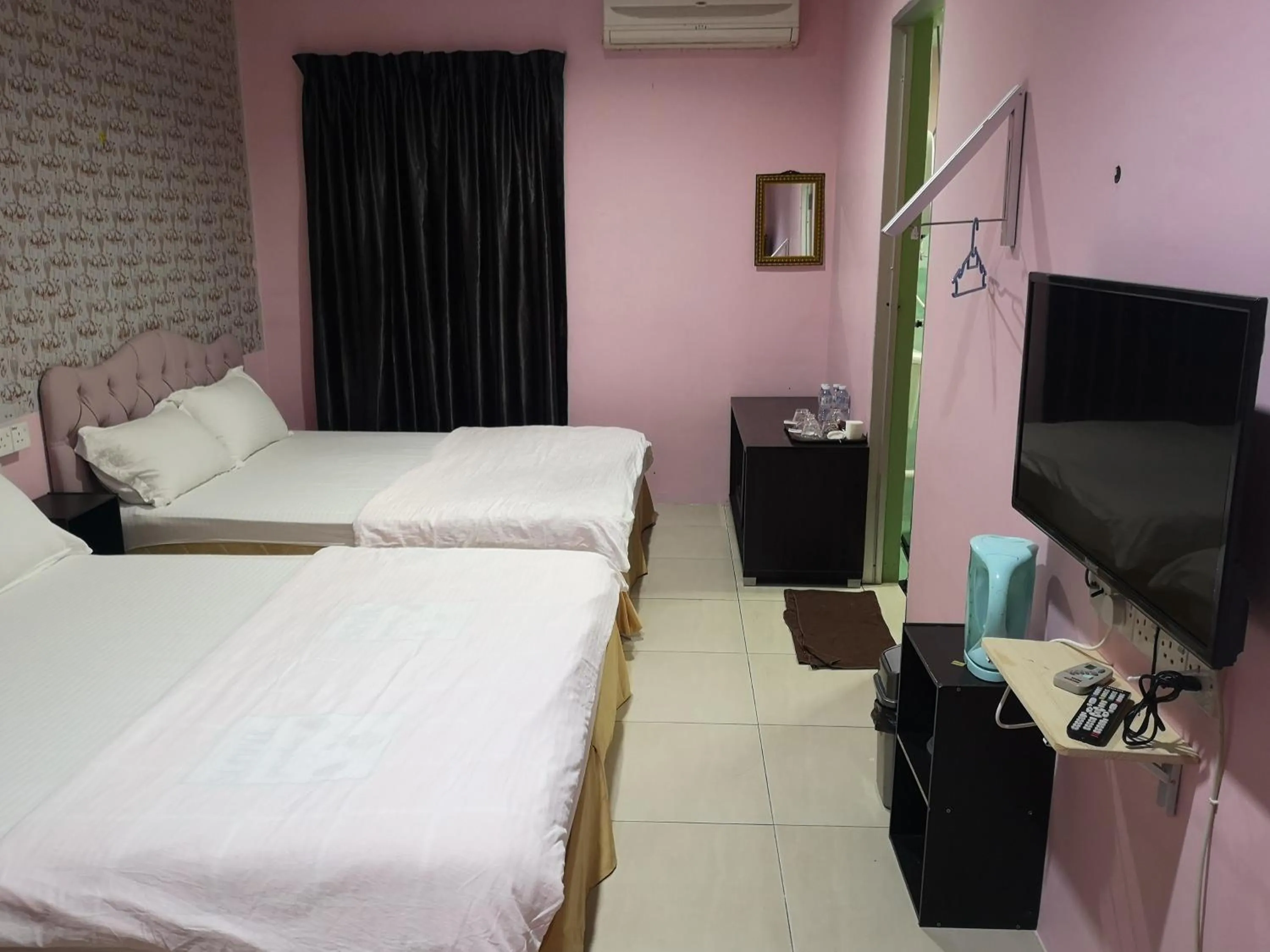 Bed in Home Inn Hotel