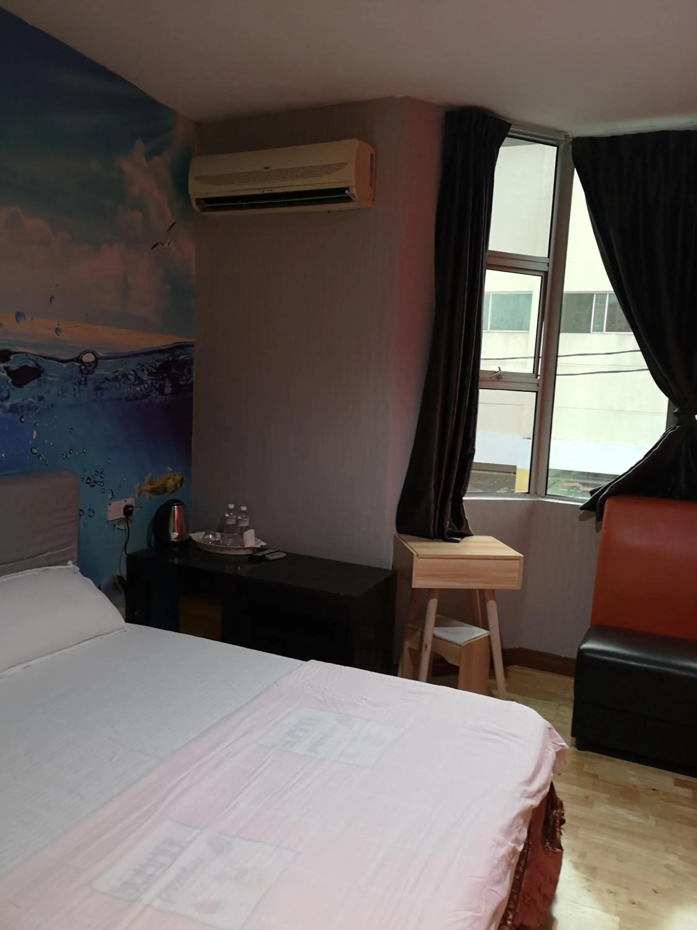 Bed in Home Inn Hotel