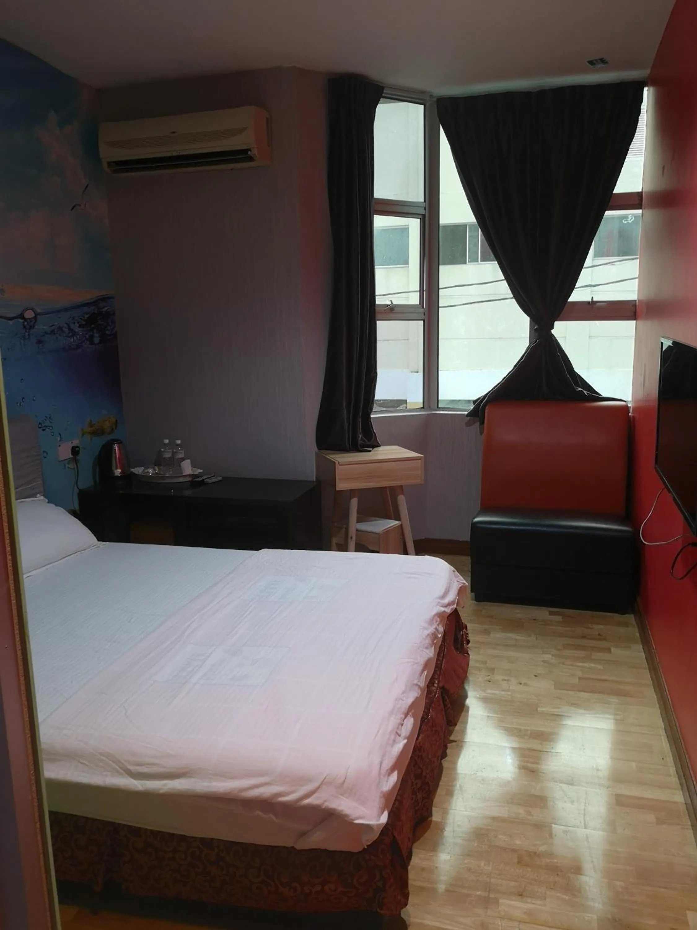 Bed in Home Inn Hotel