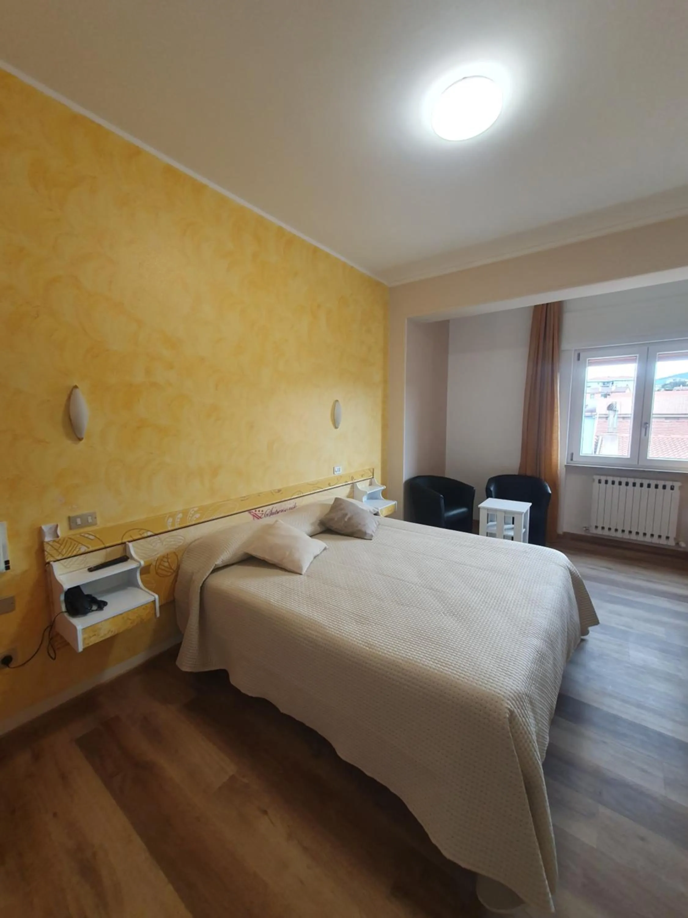 Photo of the whole room, Bed in Hotel Ristorante SUPERSONIK