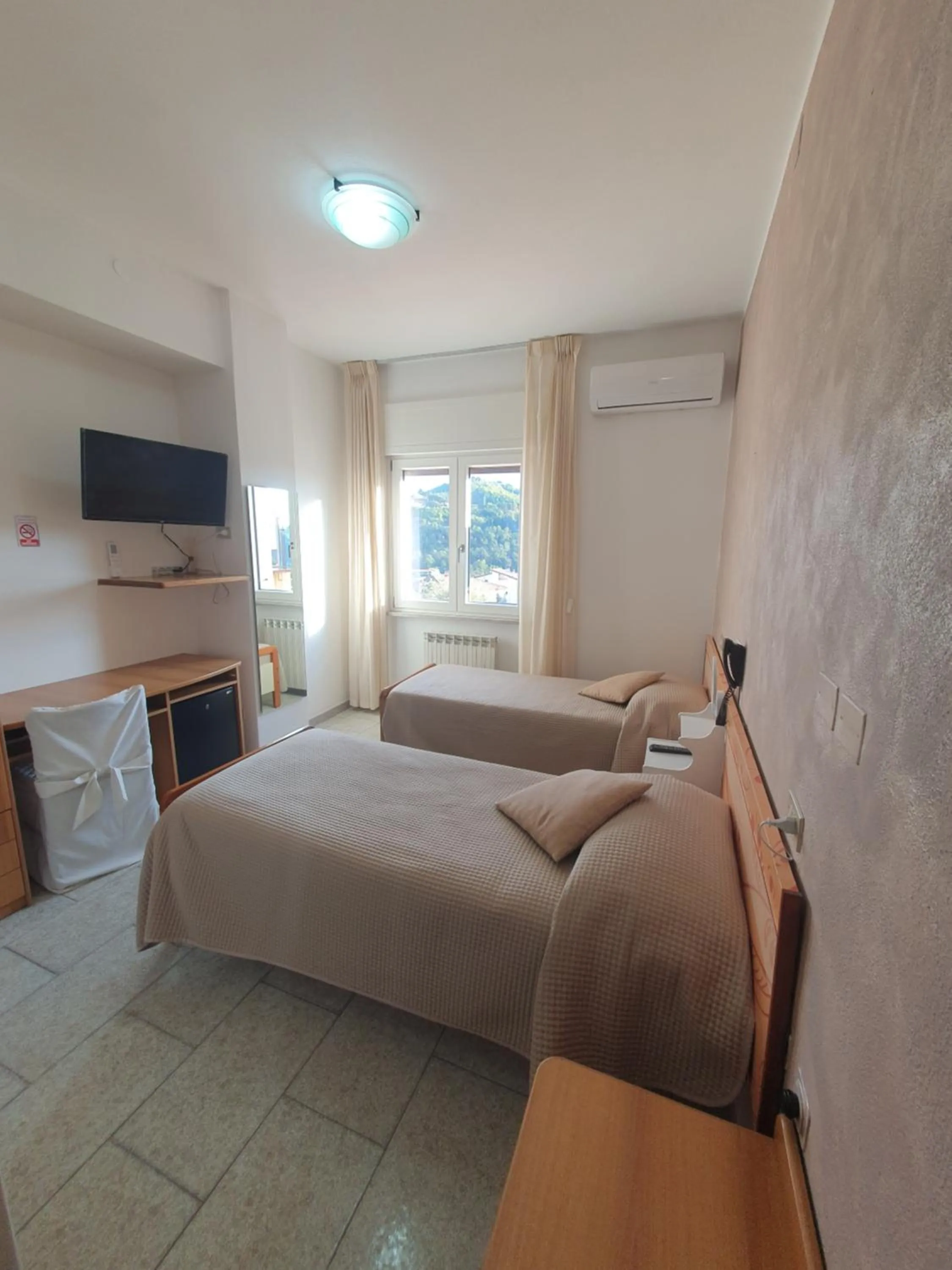 Photo of the whole room, Bed in Hotel Ristorante SUPERSONIK