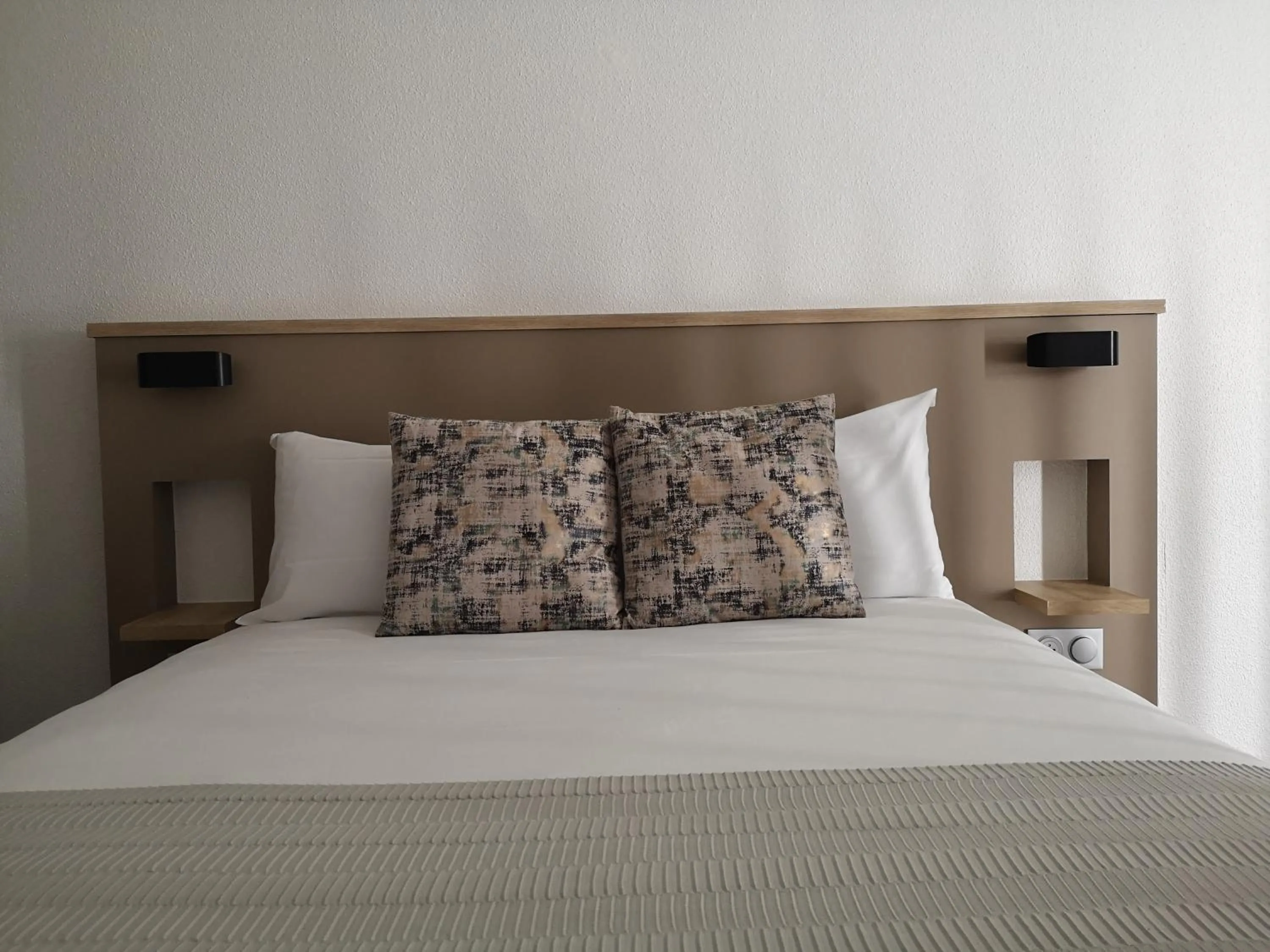 Bed in AMHotel Italie