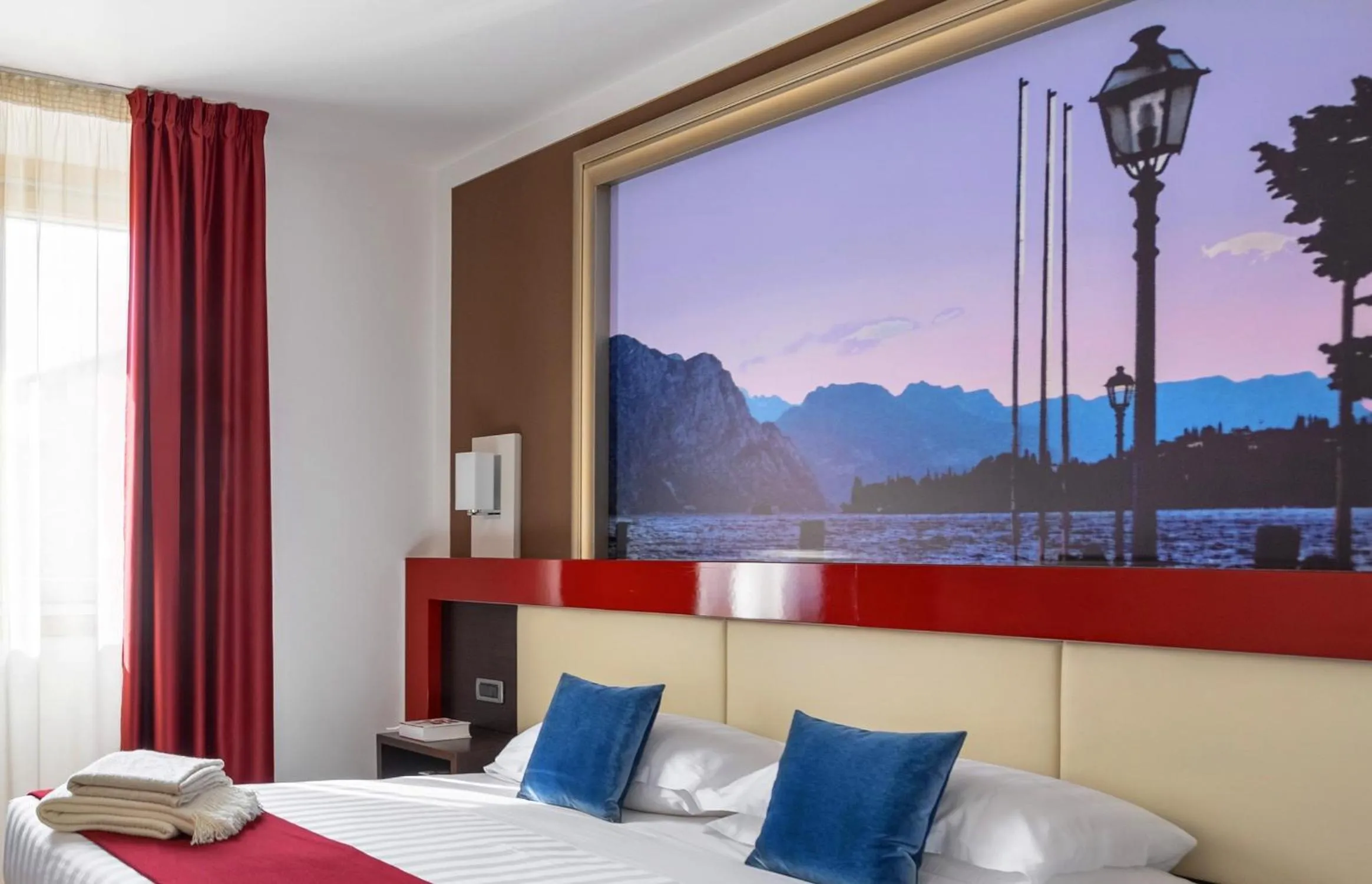 Photo of the whole room, Bed in Kairos Garda Hotel