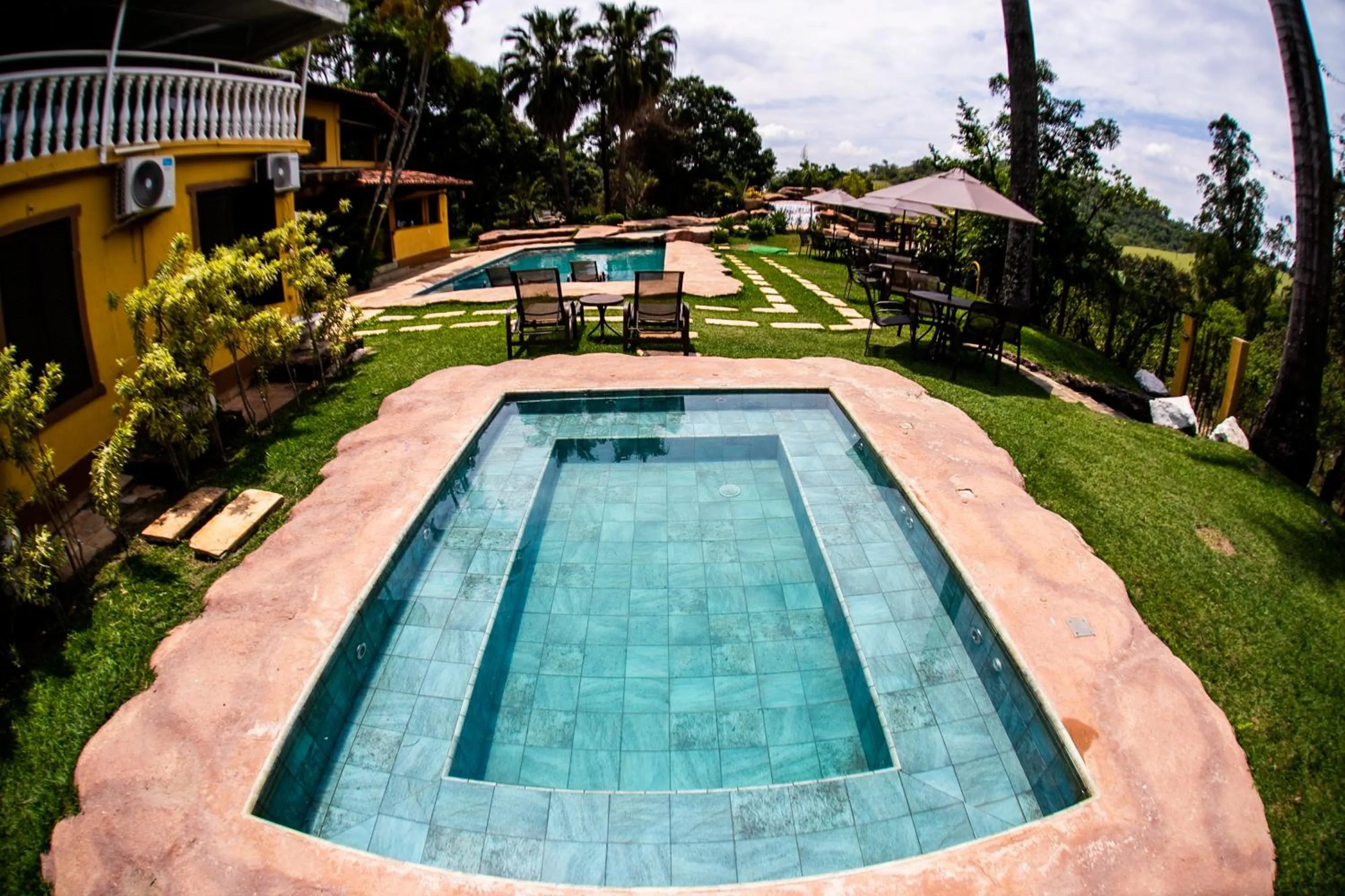 Swimming pool in Hotel Fazenda Horizonte Belo