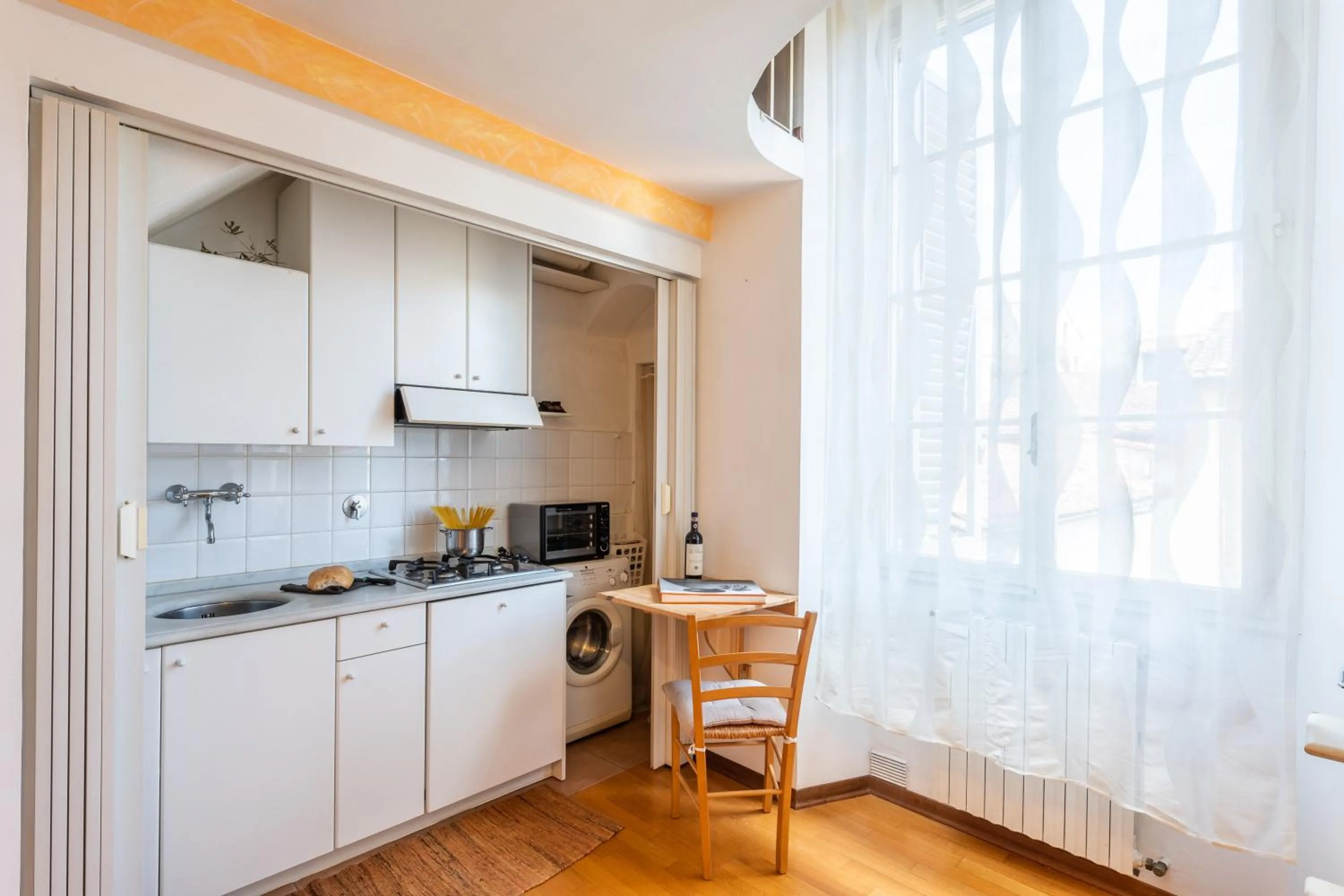 Kitchen or kitchenette in Cavourotto Terrace by Mmega