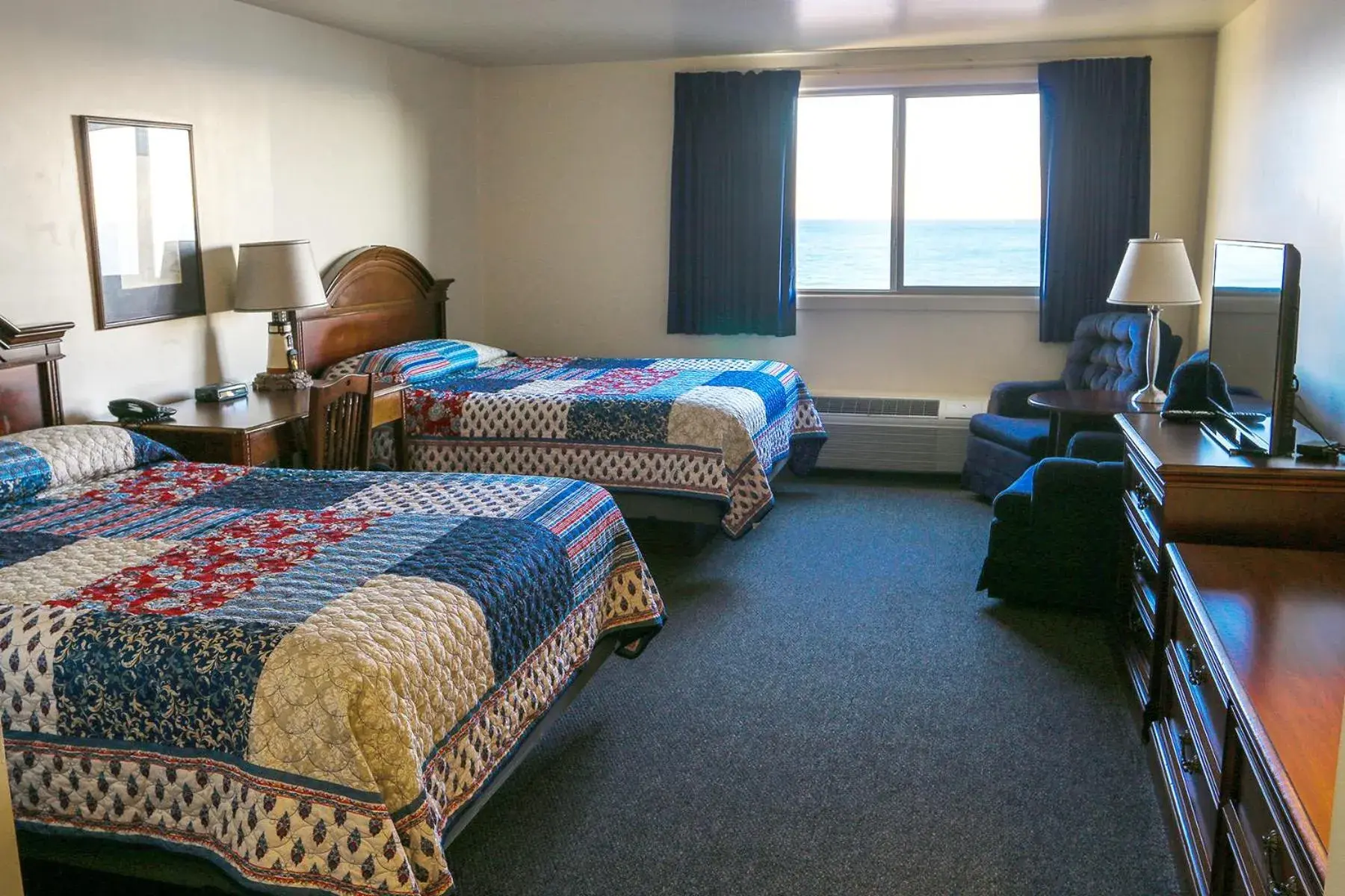 Queen Room with Two Queen Beds - single occupancy - Lake View in Lighthouse Inn - Two Rivers Queen Room with Two Queen Beds - single occupancy - Lake View in Lighthouse Inn - Two Rivers