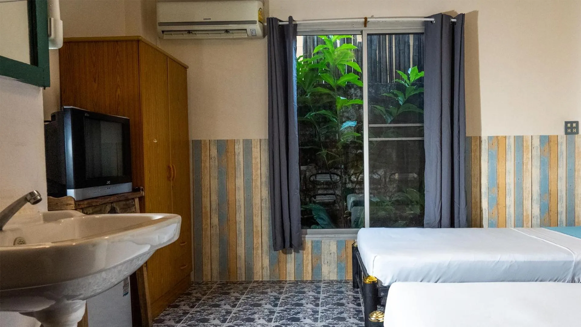 Photo of the whole room, Bed in Sabina Guesthouse Kamala