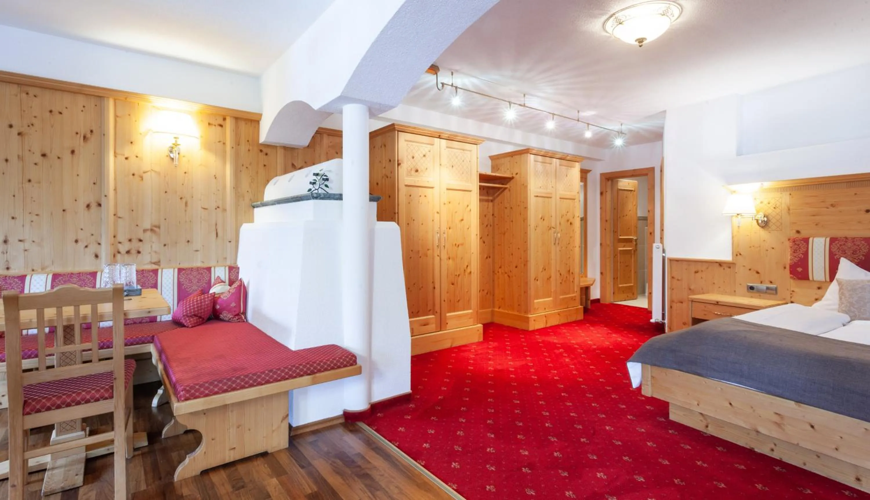 Living room, Bed in Hotel Stern