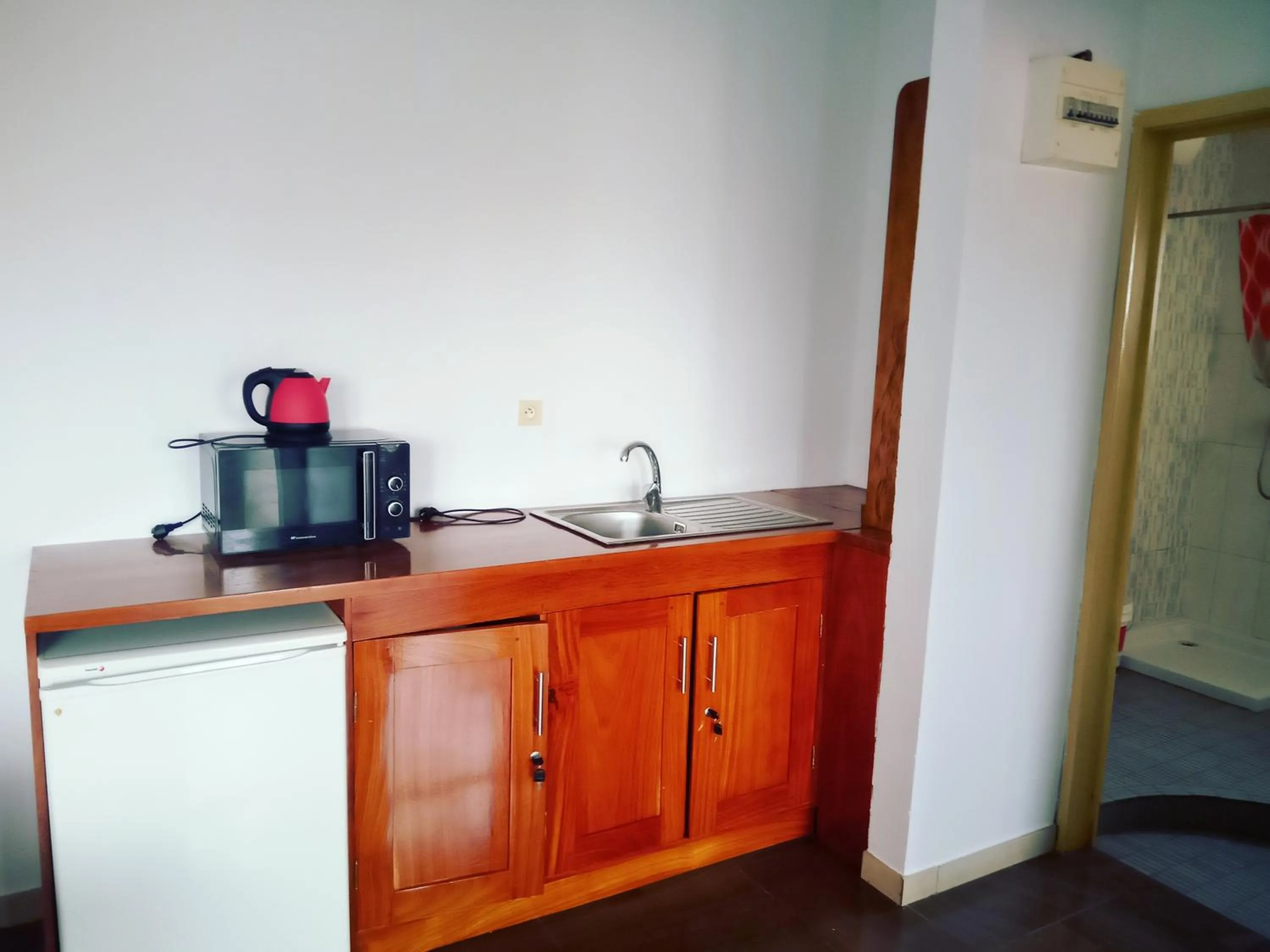 Kitchen or kitchenette in Residence Jardin Tropical