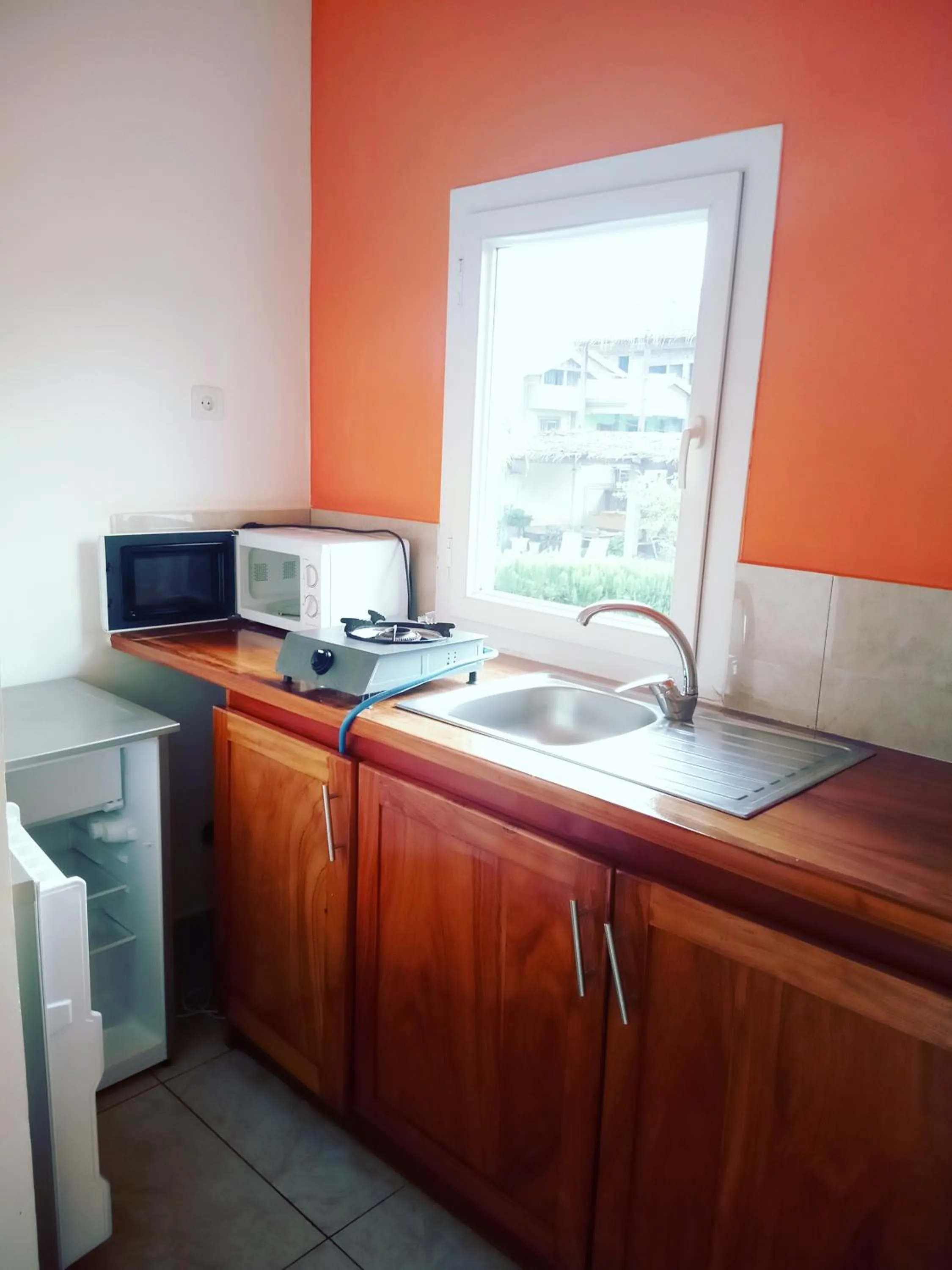 Kitchen or kitchenette in Residence Jardin Tropical