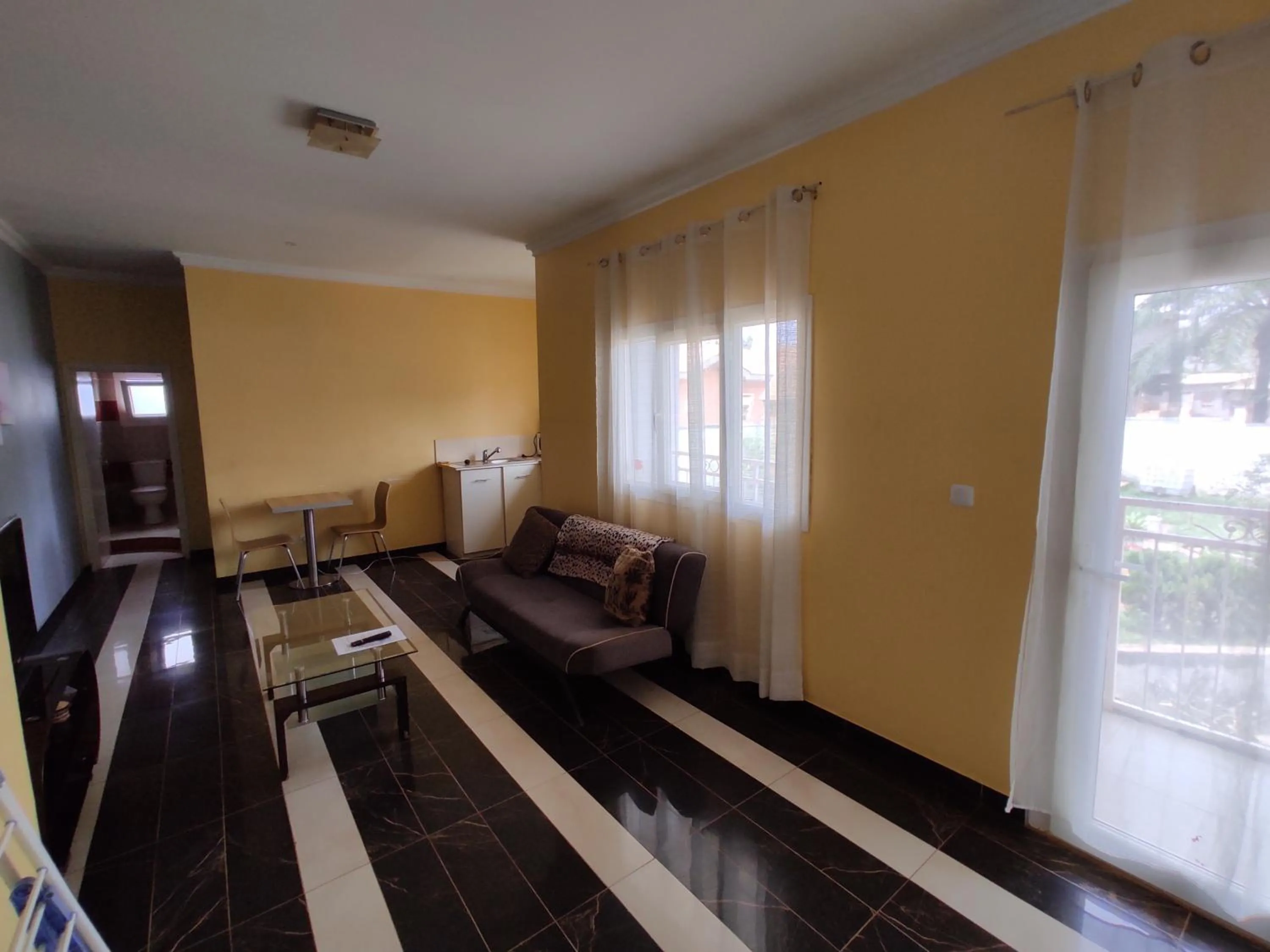 Living room in Residence Jardin Tropical