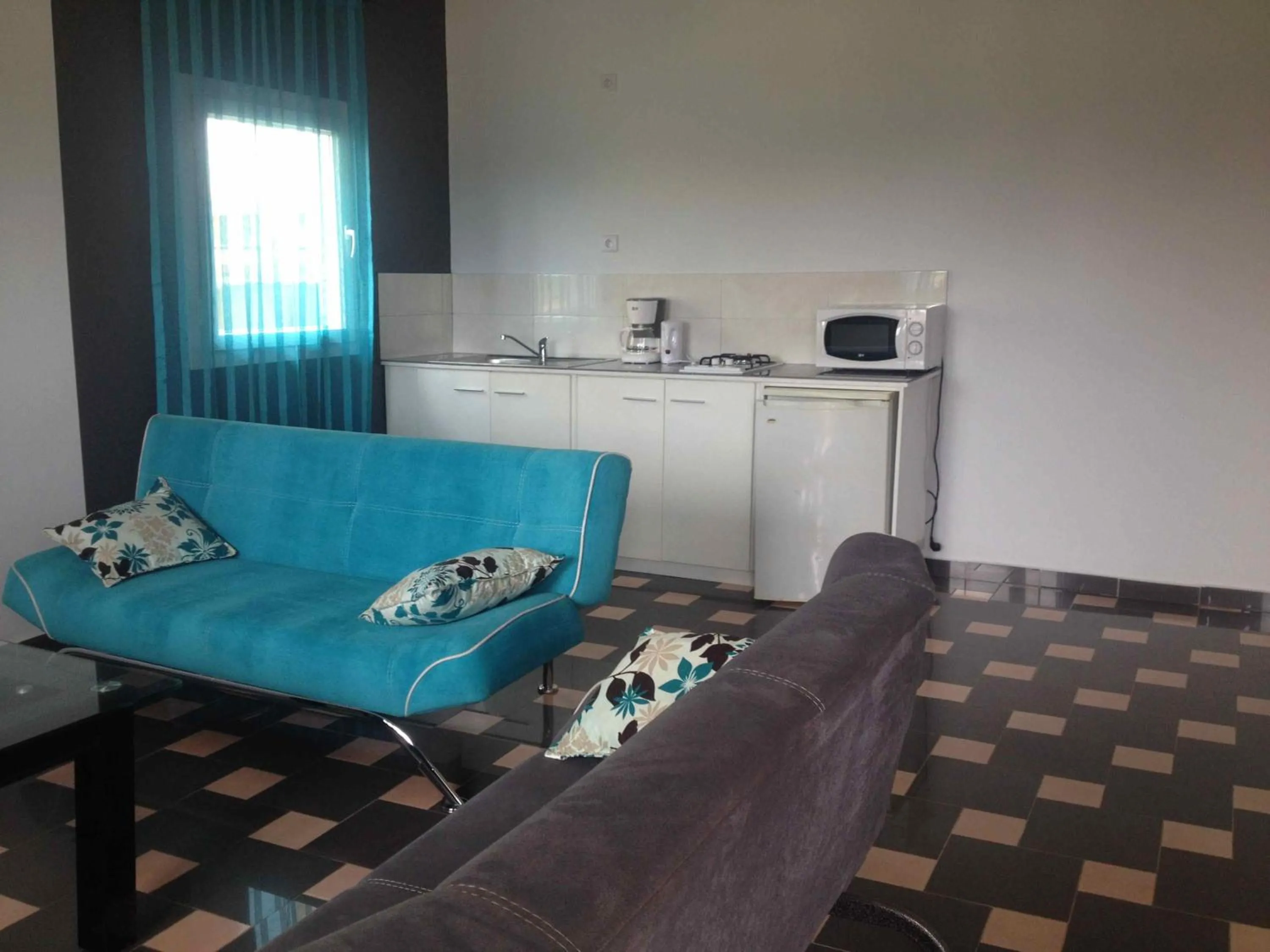 Living room in Residence Jardin Tropical