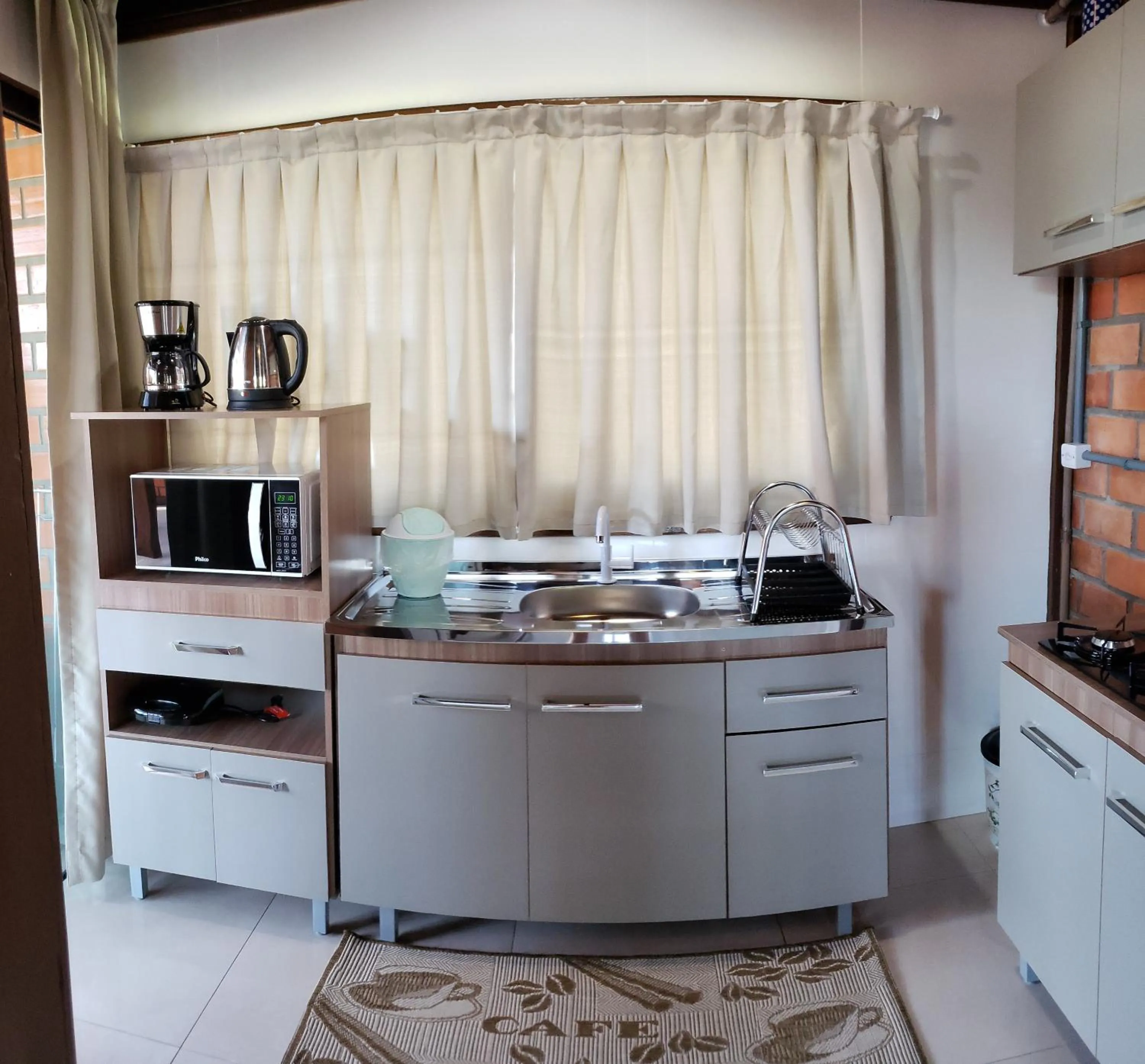 Kitchen or kitchenette in Pousada Doce Mar