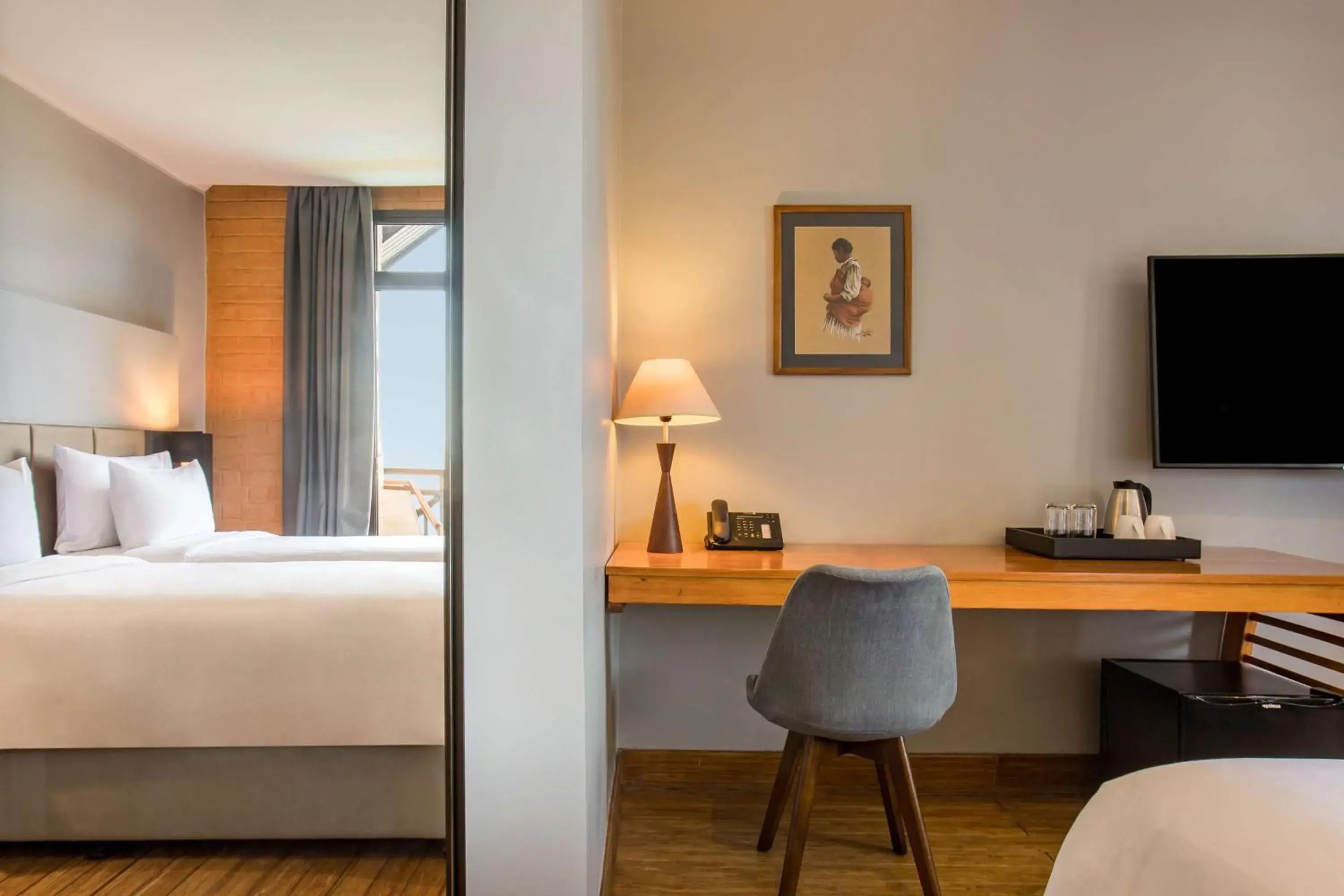 Photo of the whole room, Bed in Radisson Hotel Tamboho Waterfront Antananarivo Photo of the whole room, Bed in Radisson Hotel Tamboho Waterfront Antananarivo