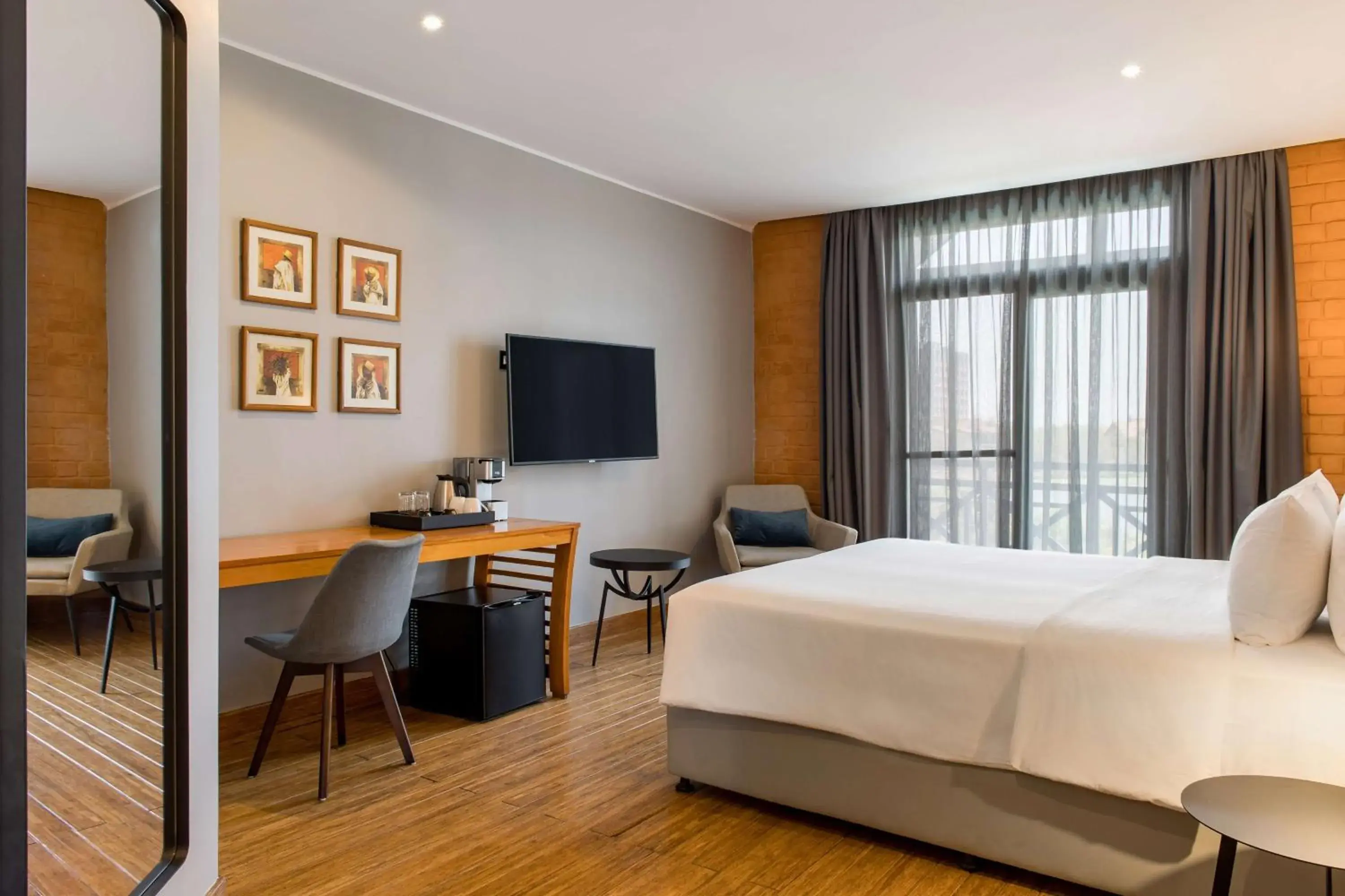 Photo of the whole room, Bed in Radisson Hotel Tamboho Waterfront Antananarivo Photo of the whole room, Bed in Radisson Hotel Tamboho Waterfront Antananarivo