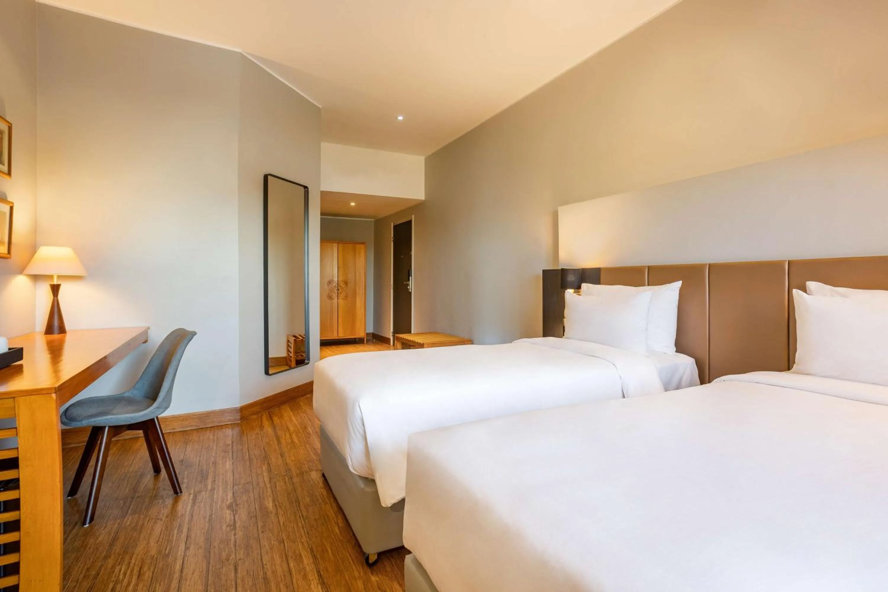 Photo of the whole room, Bed in Radisson Hotel Tamboho Waterfront Antananarivo